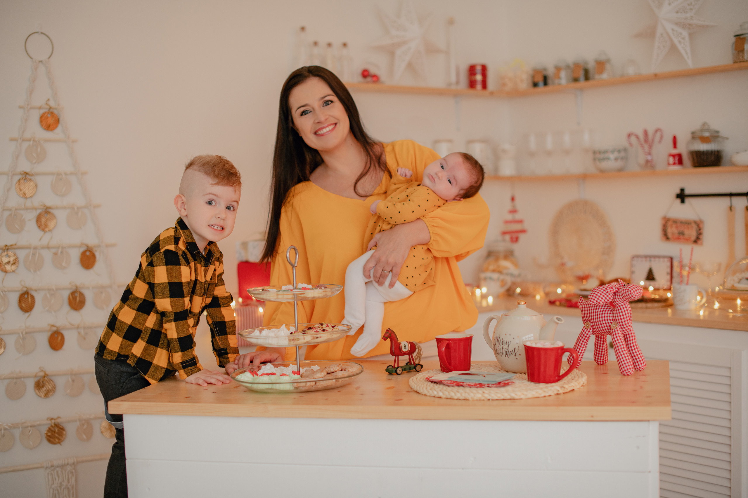 Family photography in a Christmas studio in Prague. Professional photographer in Prague Anastasia Haritonova