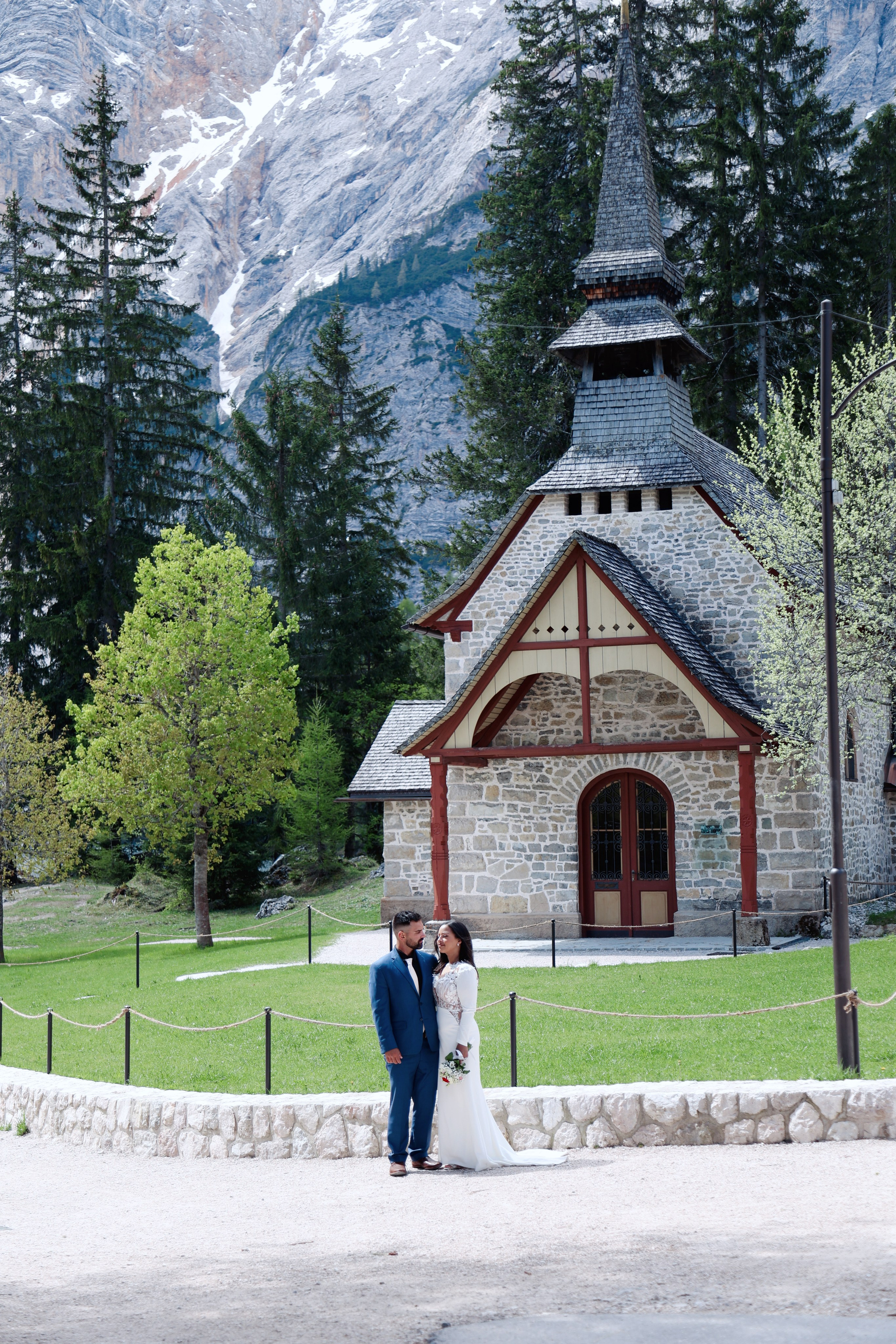 Couple exchanging vows on Lake Braies in the Dolomites