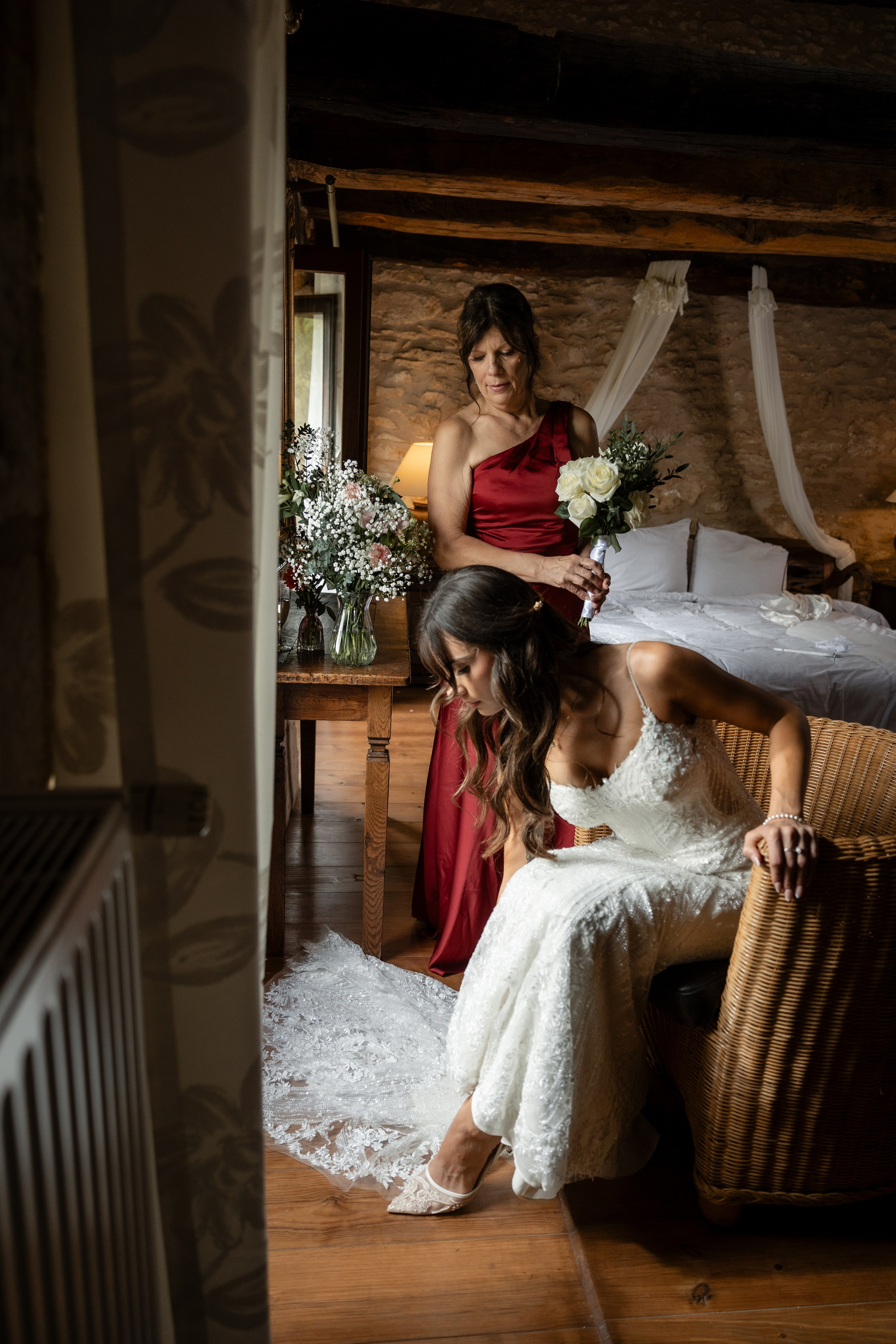 Bride getting ready at Château Lagut, Dordogne – fine art destination wedding photography.