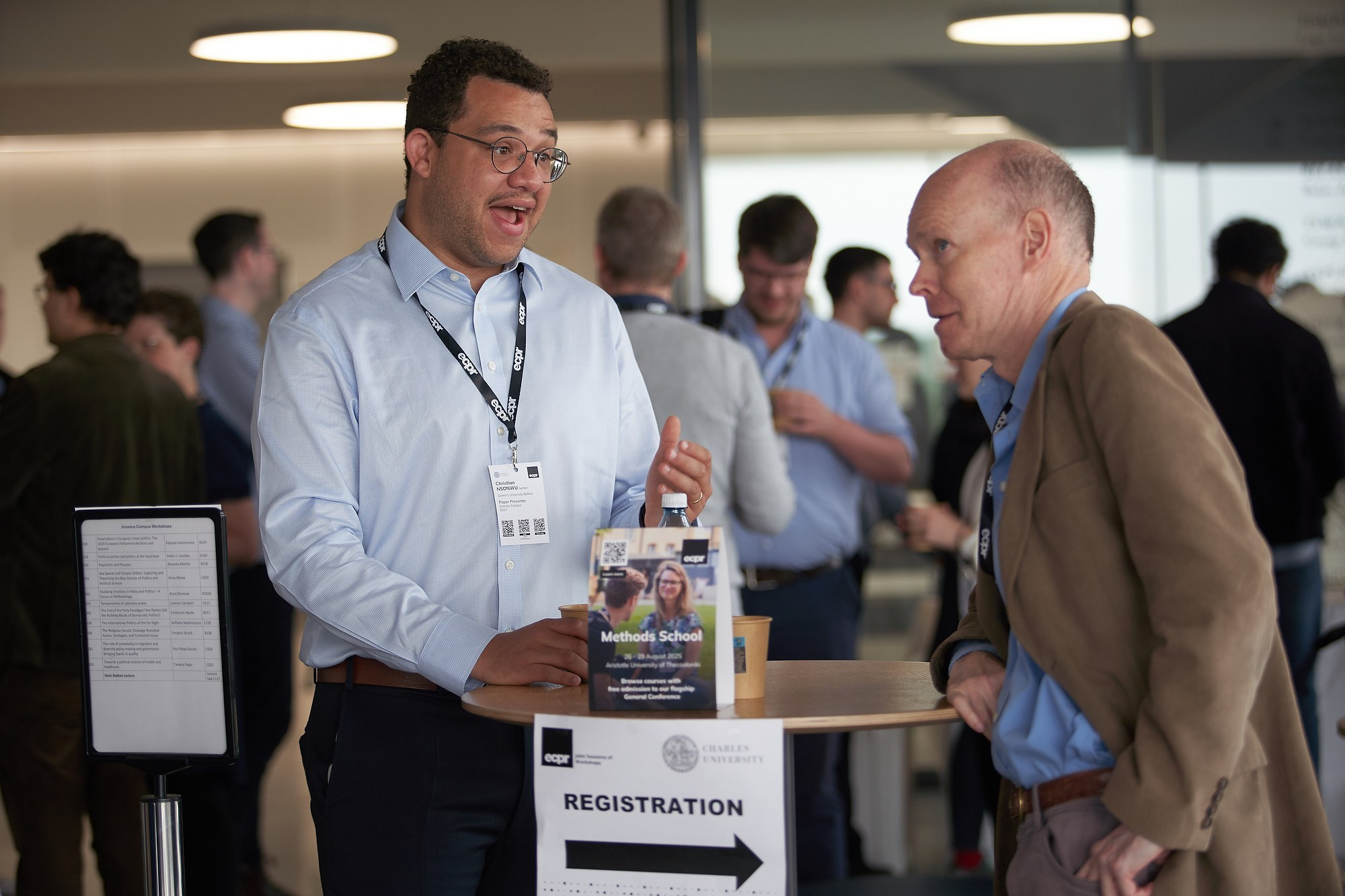 Attendees network between ECPR workshop sessions at Charles University.