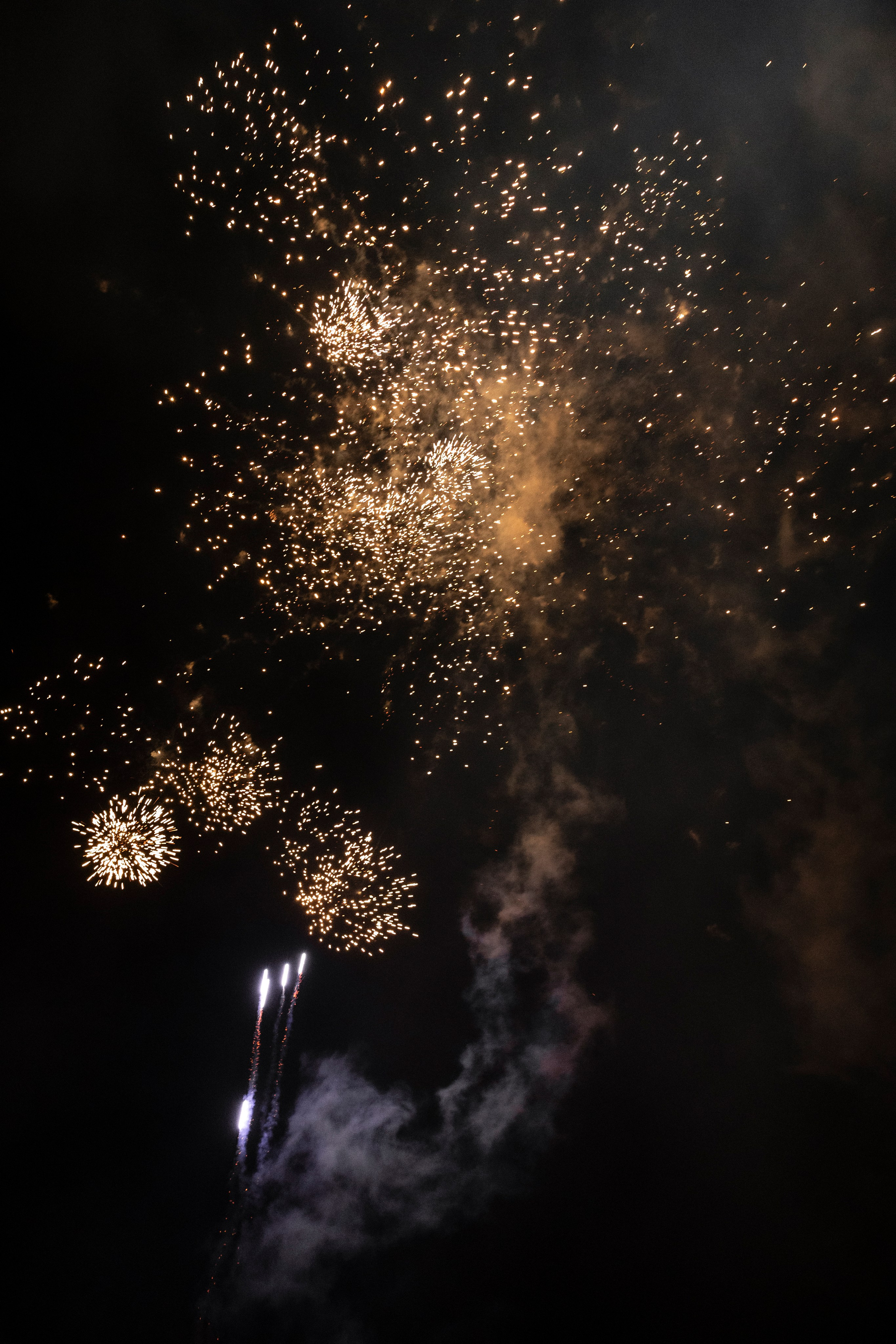 Fireworks above Château Lagut to end destination wedding in France.