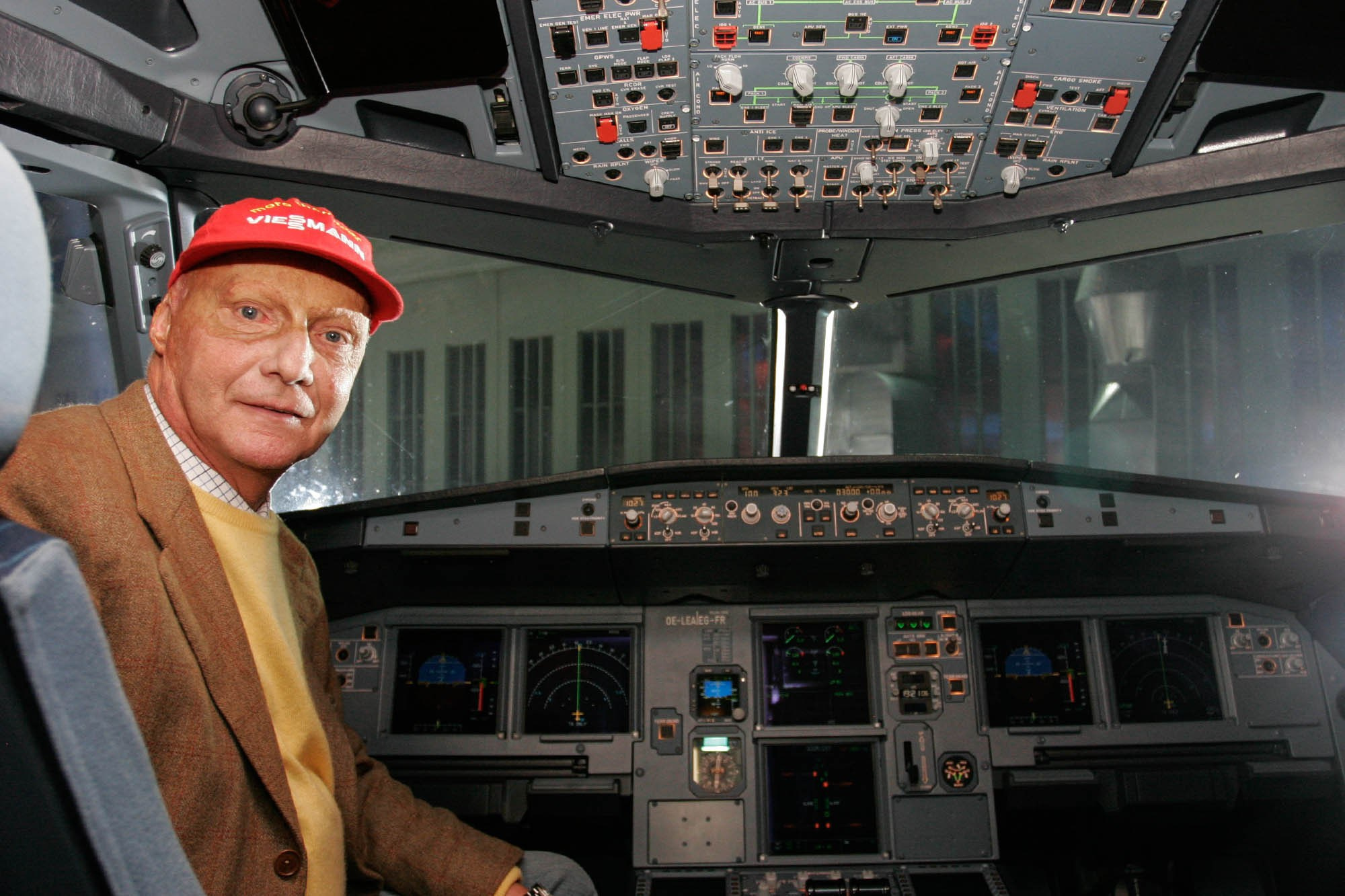F1 legend Niki Lauda photographed in the cockpit of his plane after landing in Tegel in Berlin.