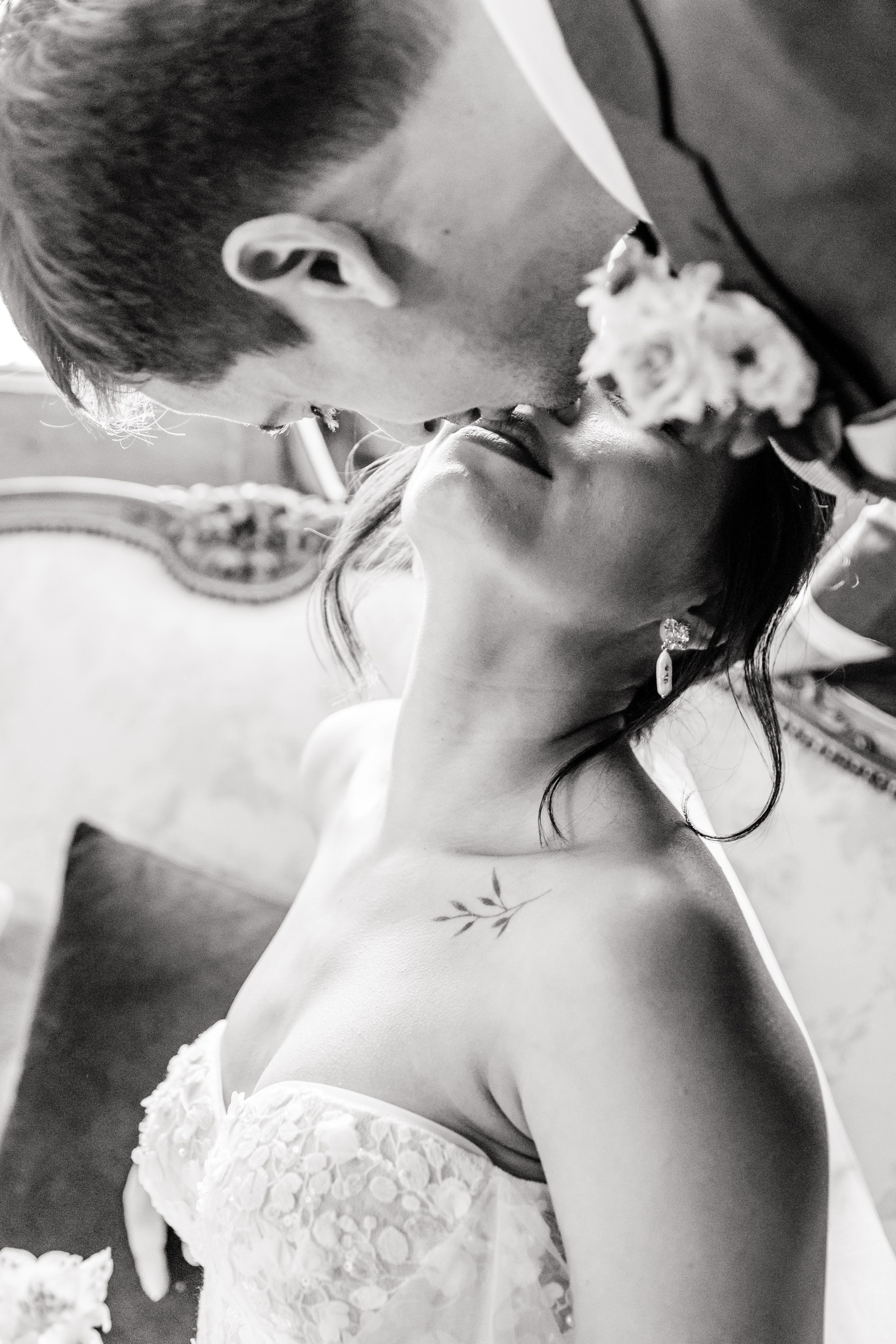 Close-up portrait of the bride and groom kissing, showcasing their love during a Barcelona wedding.