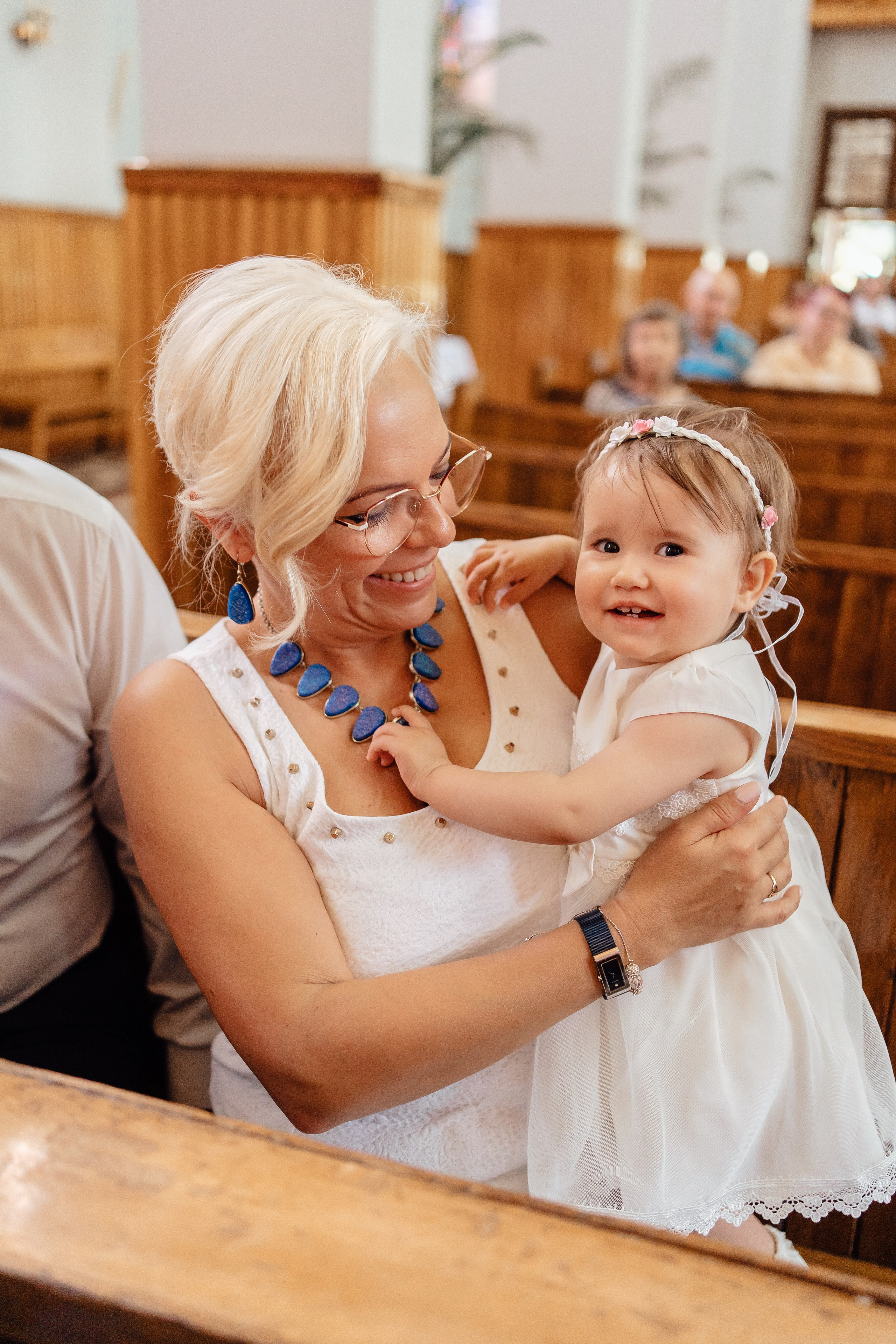 Chrzest Święty Natalii. Fotograf Łódź - sesja ciążowa, noworodkowa, dziecięca. Studio w Łodzi