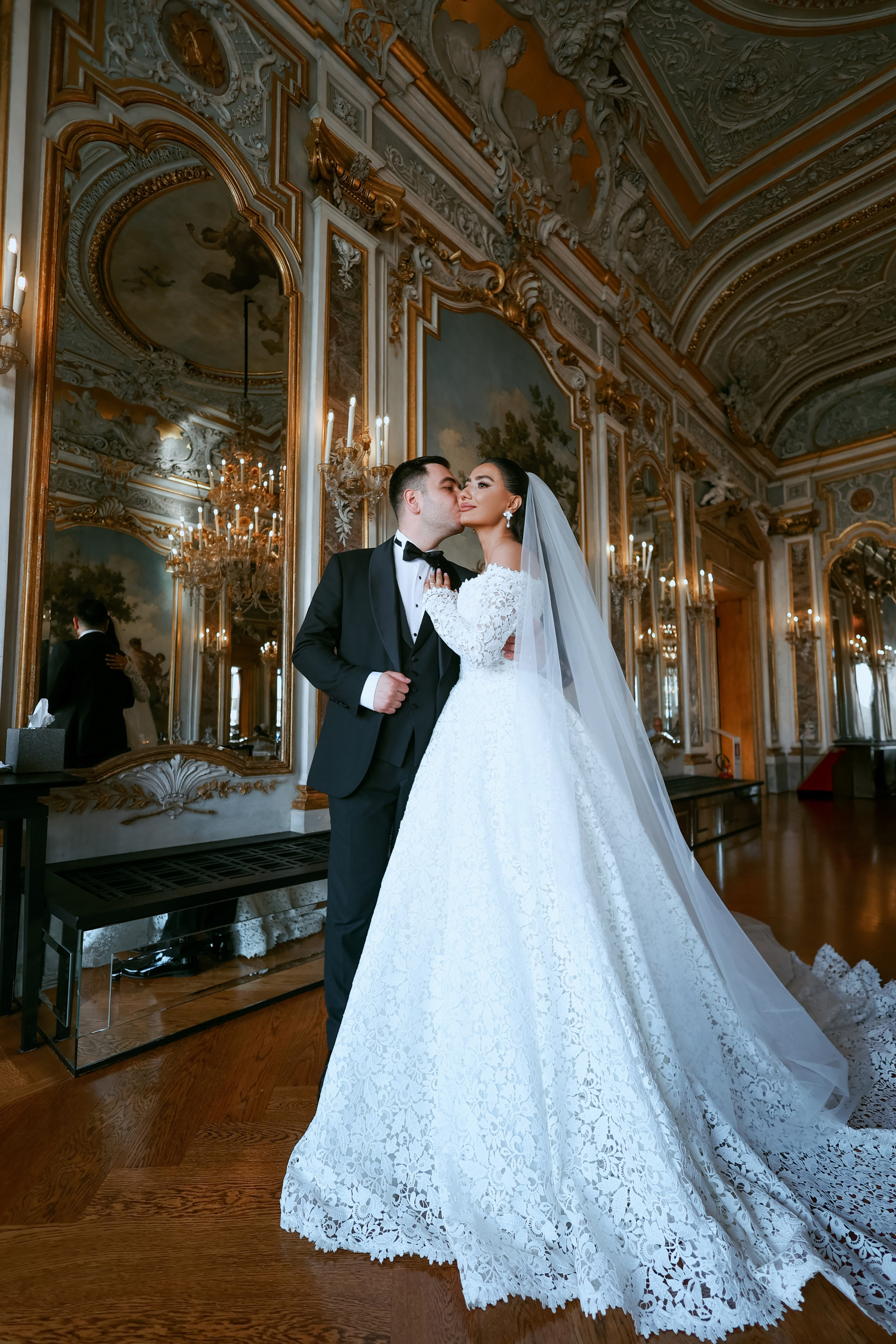 Elegant portrait of an Armenian bride and groom inside Aman Venice hotel