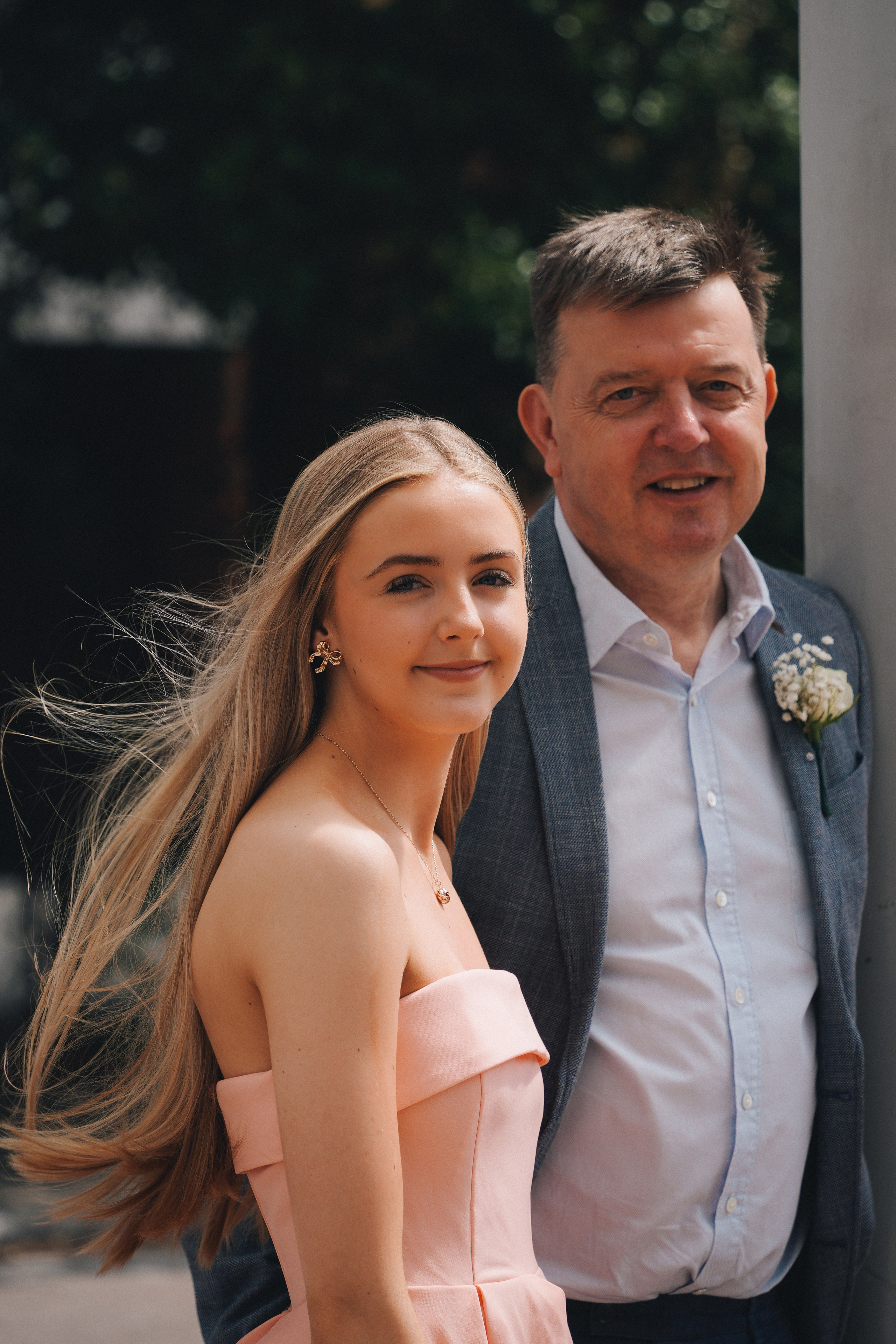 Relaxed family gathering outside Solihull Register Office on wedding day