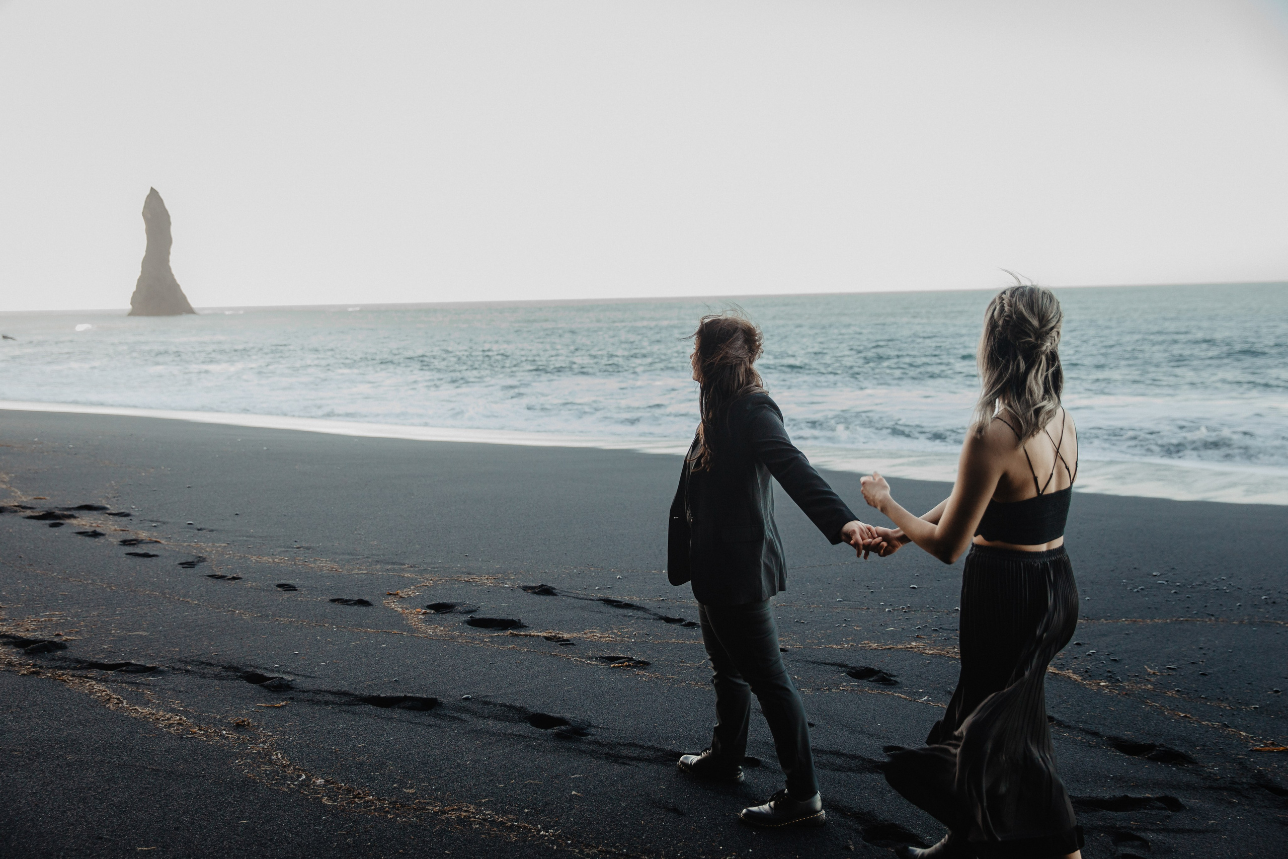Same Sex Wedding at Iceland Black Sand Beach. Iceland elopement photographer & videographer