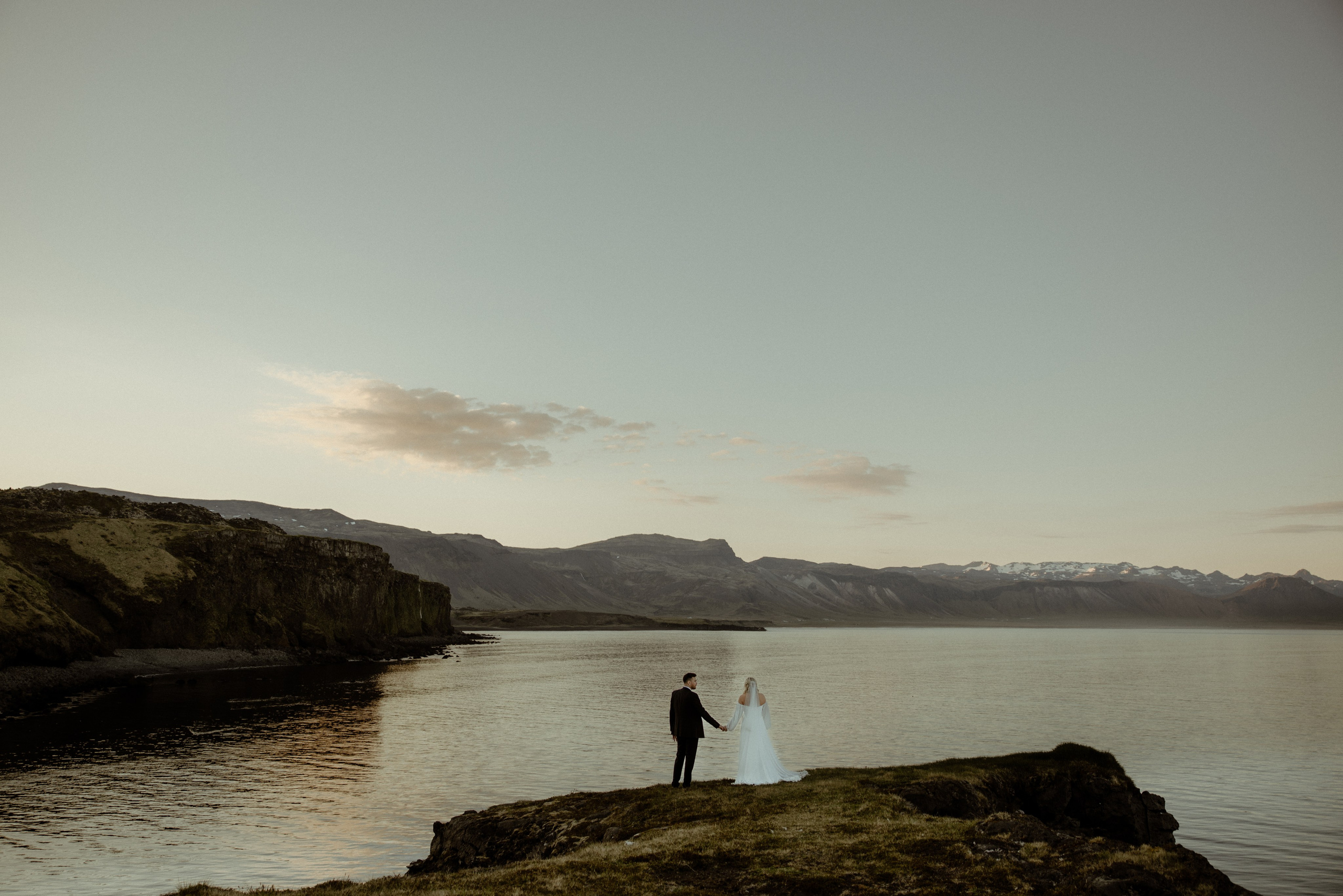 Iceland elopement at Budir with midnight sun wedding photos at black sand beach. Iceland elopement photo and video | Nikolaichik Photo