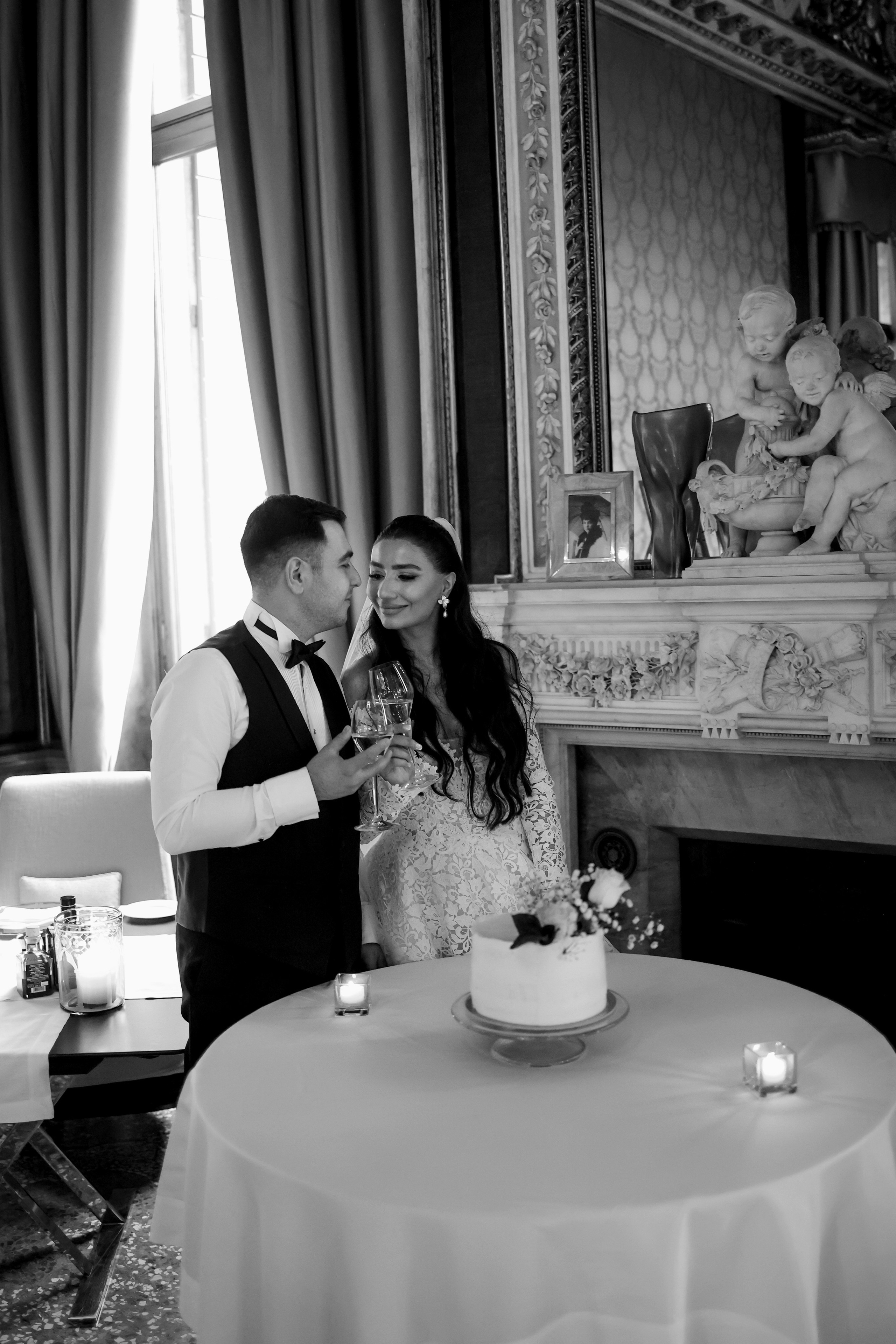 Timeless black and white portrait of Armenian couple in an elegant room at Aman Venice