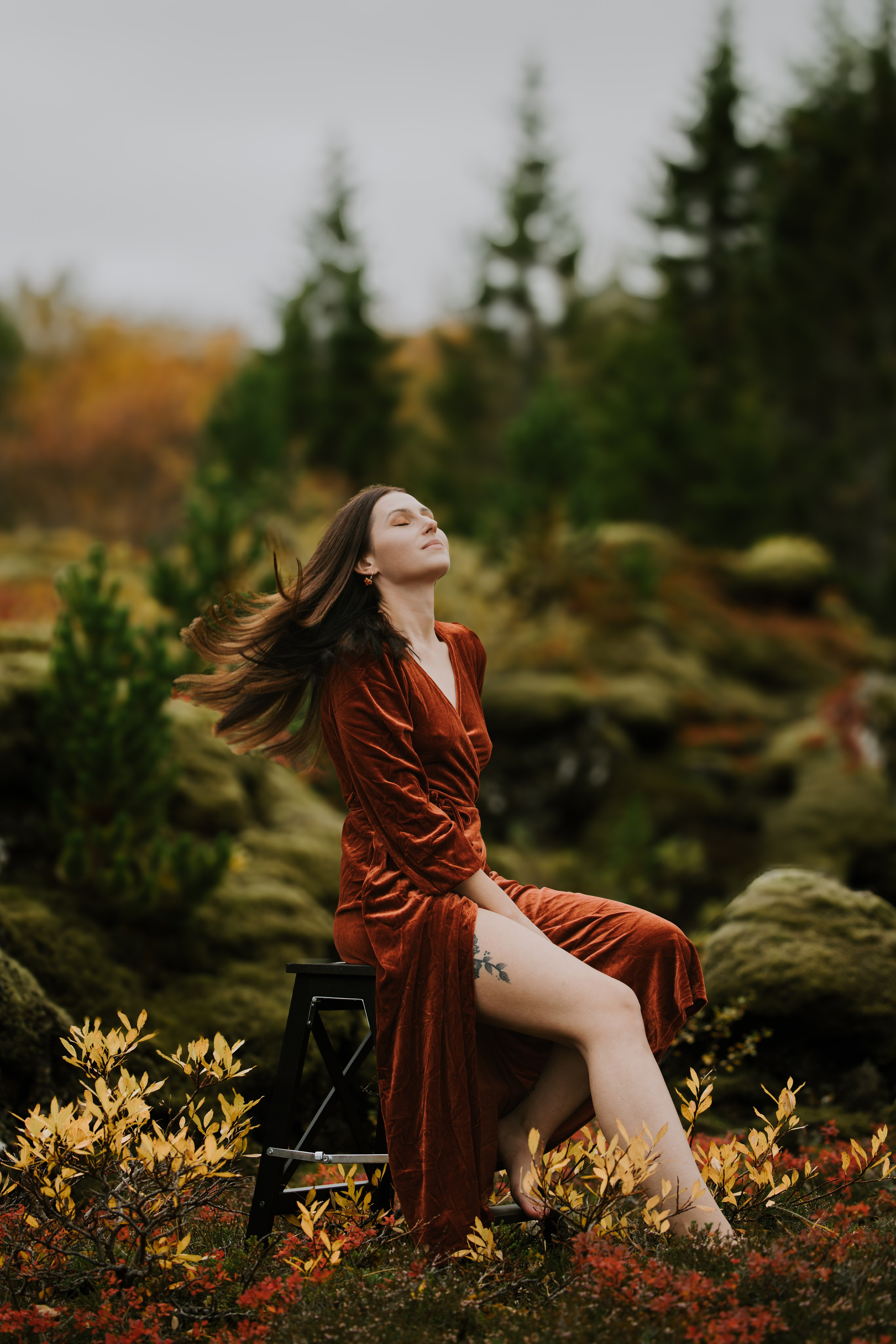 Iceland photography sessions in stunning landscapes, including waterfalls, mountains, and black sand beaches