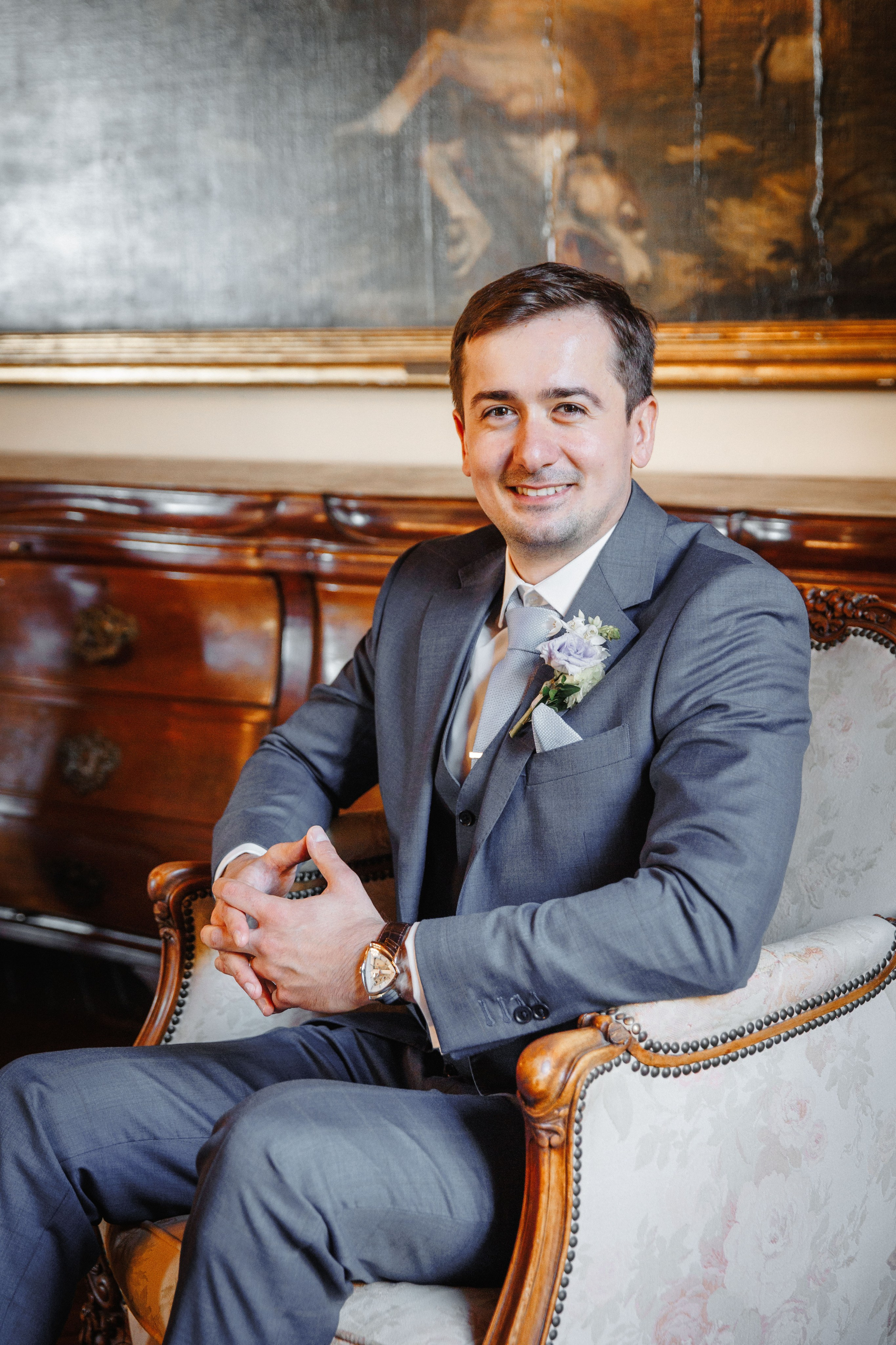 Natural light portrait of the groom smiling warmly, emphasizing his joy on the wedding day in Barcelona.