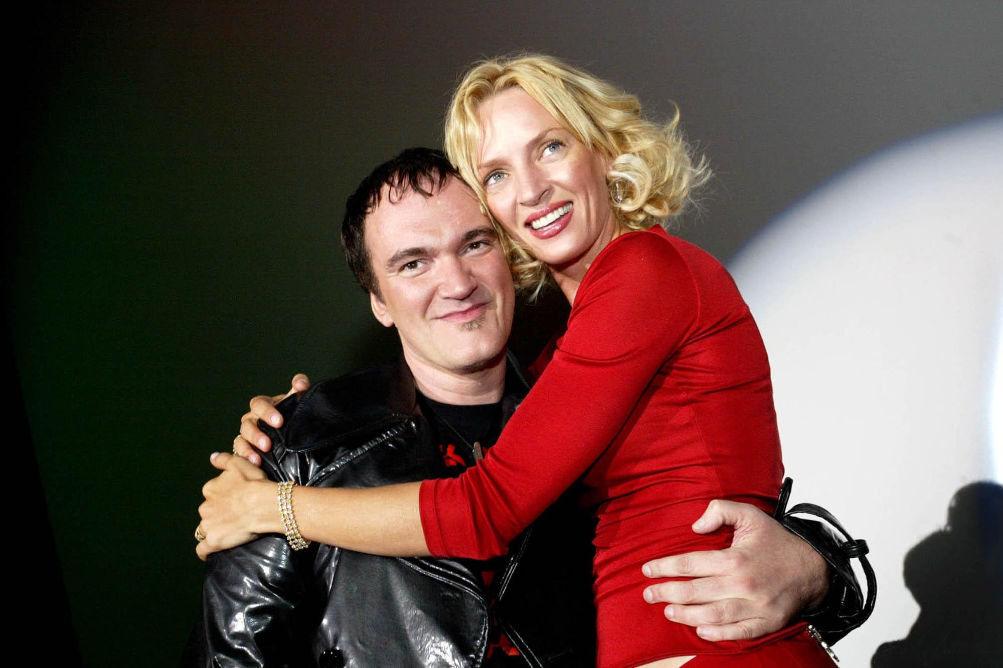 Tarantino and Uma Thurman embrace at Kill Bill premiere.