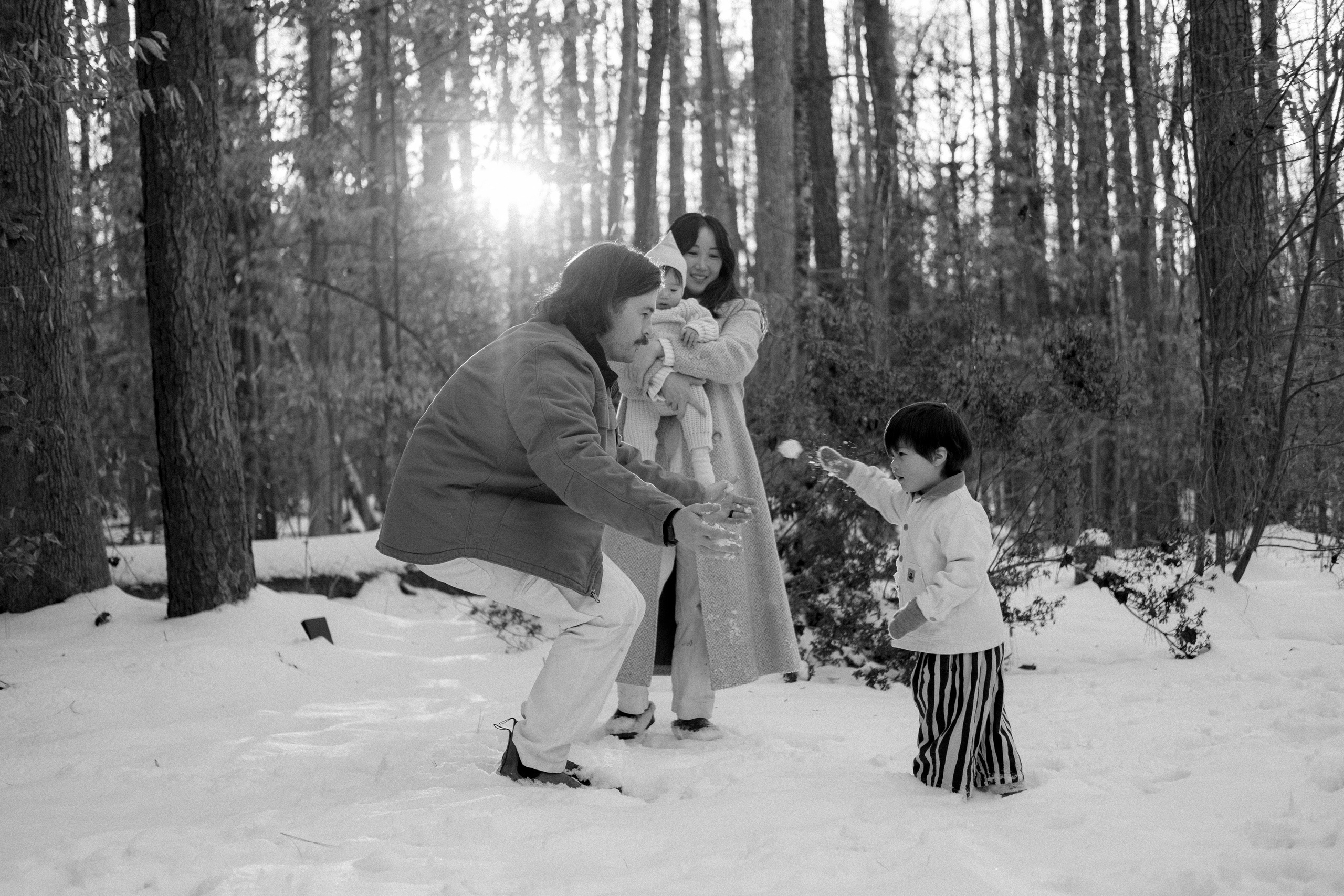 Snowy playtime and warm embraces in the forest near Richmond, VA — the perfect mix of energy and love.