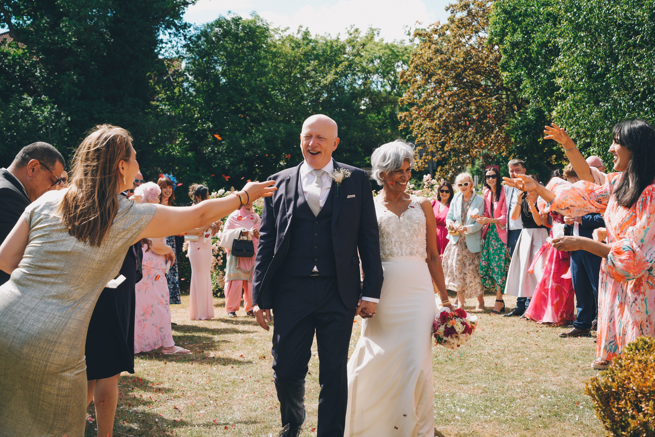 Guests throwing confetti outside the registry office in Solihull