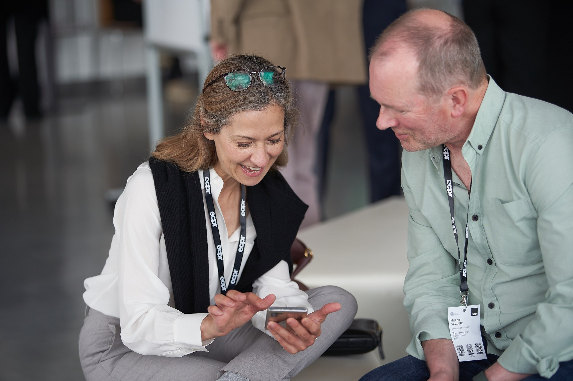 Attendees of the ECPR workshop share their notes during a break.