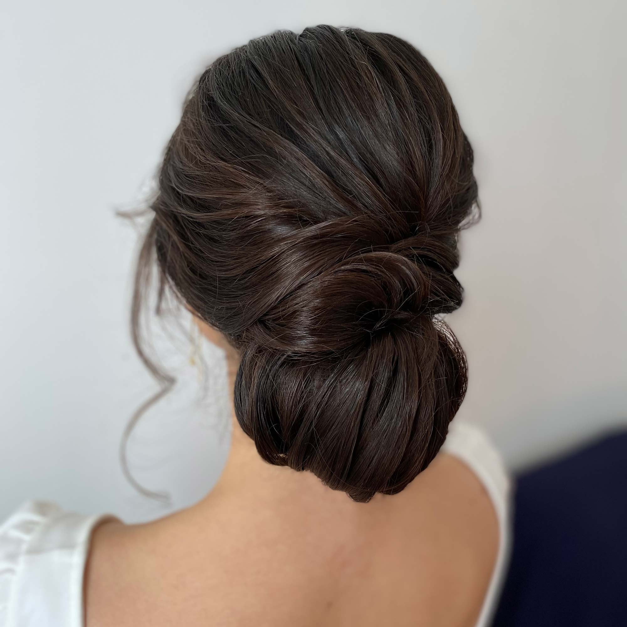 bridal hairstyle idea on brunette hair. up-do low bun