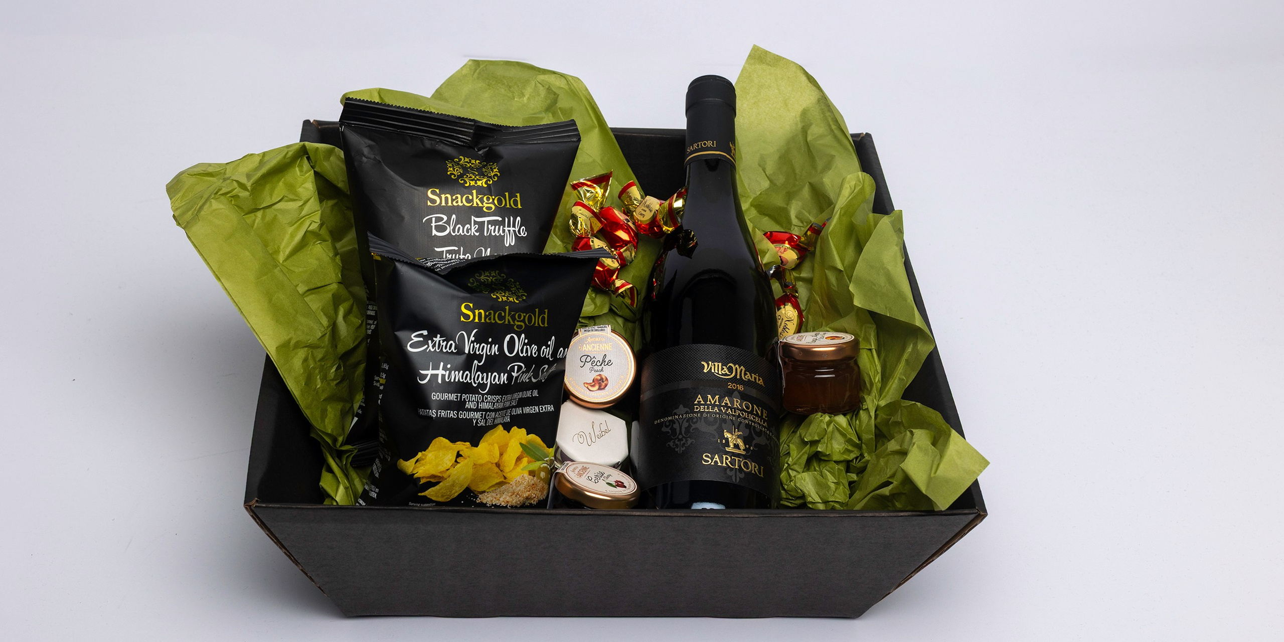 Akropolis Blomster tilbyder firma gaver med specialiteter og vin – hurtigt leveret