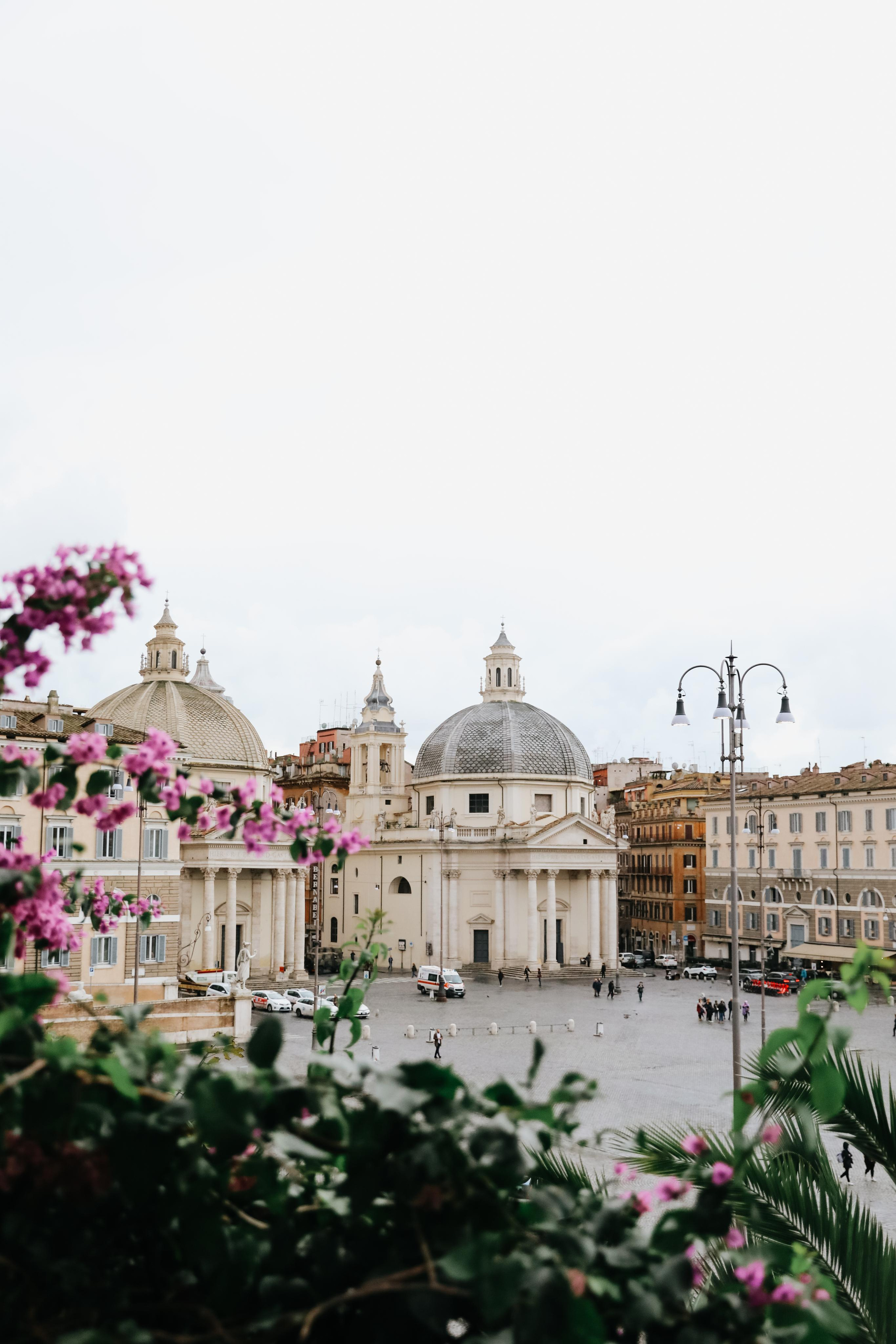 THREE COINS IN THE TREVI FOUNTAIN. Photographer in Rome