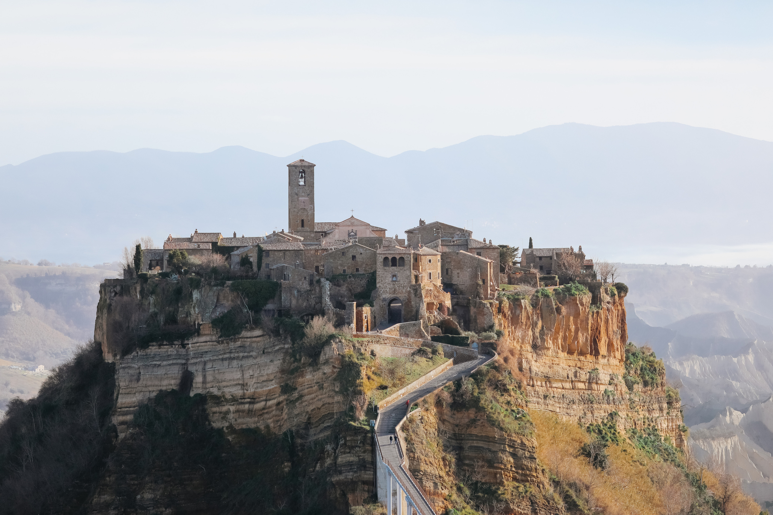 THREE COINS IN THE TREVI FOUNTAIN. Photographer in Rome