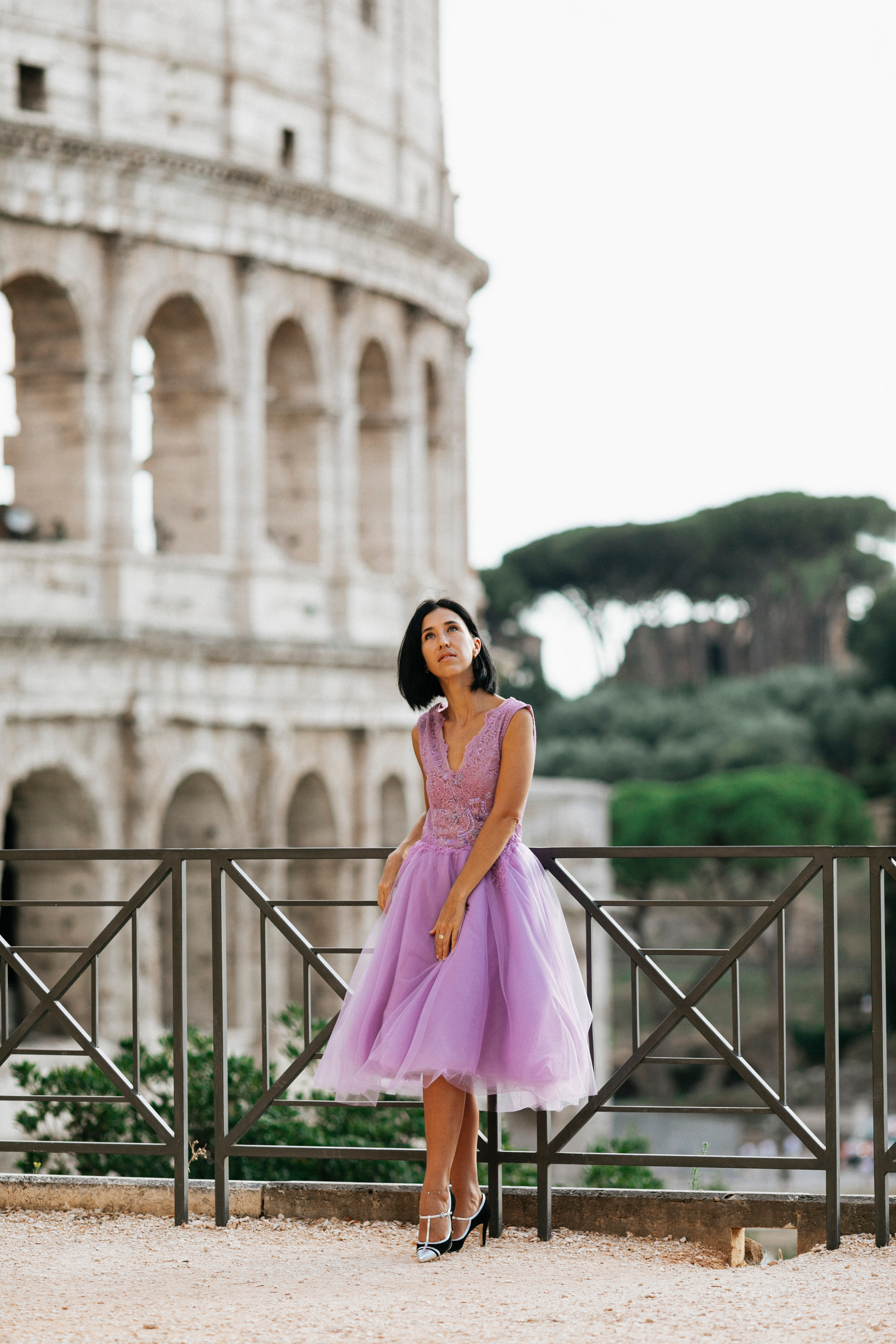 THREE COINS IN THE TREVI FOUNTAIN. Photographer in Rome