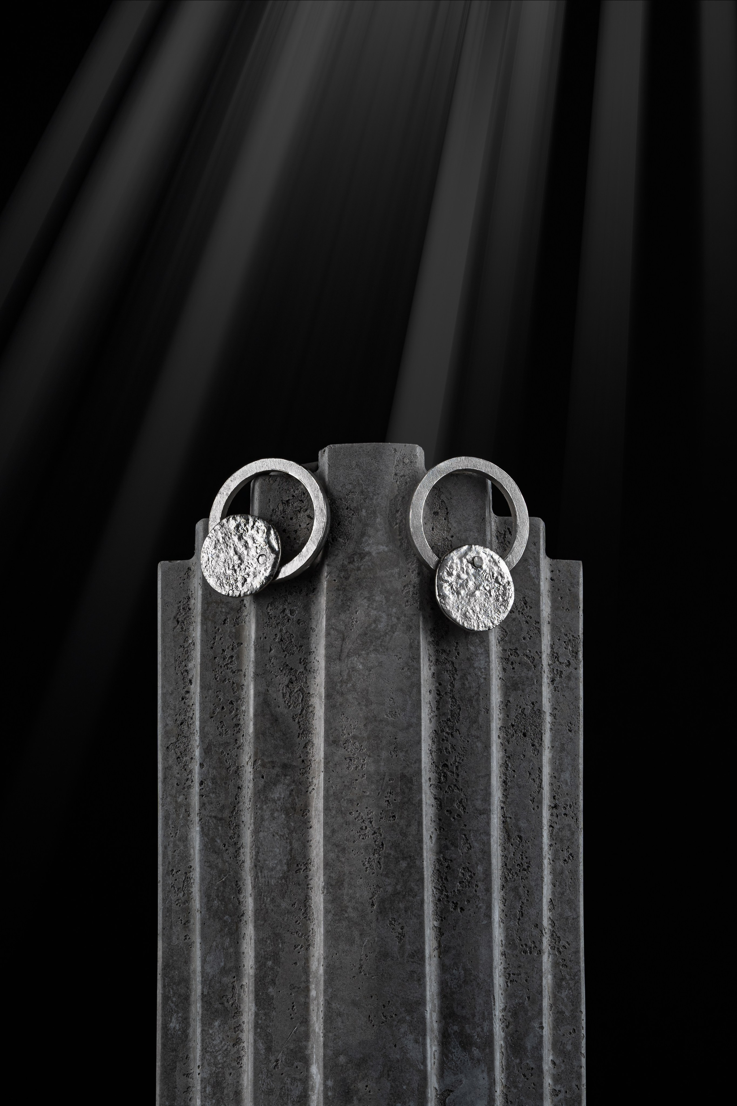 Jewelry photography for a Barcelona-based brand, emphasizing fine metalwork.