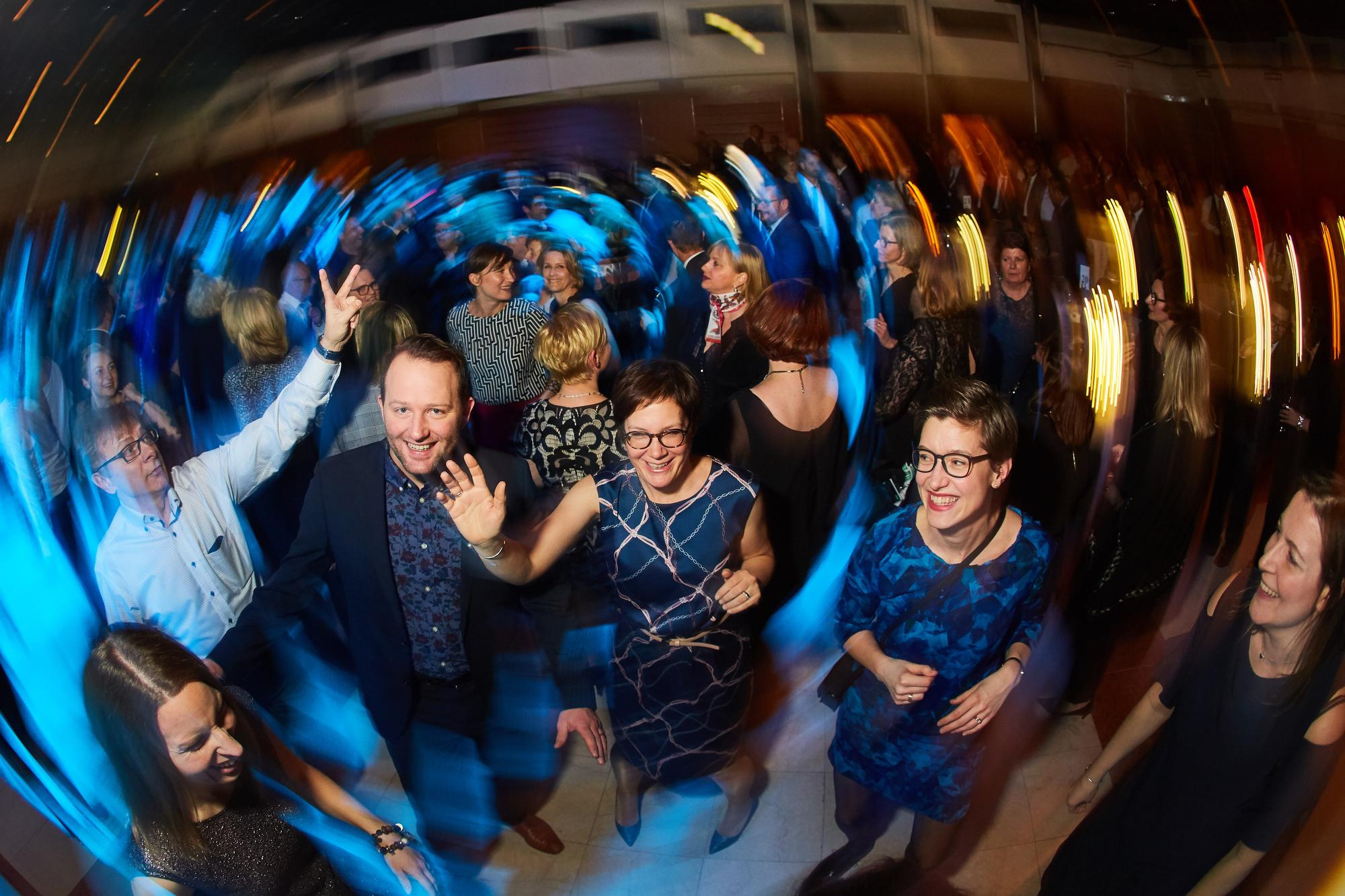 Live band performs on state as Bio-Rad employees scream and shout.