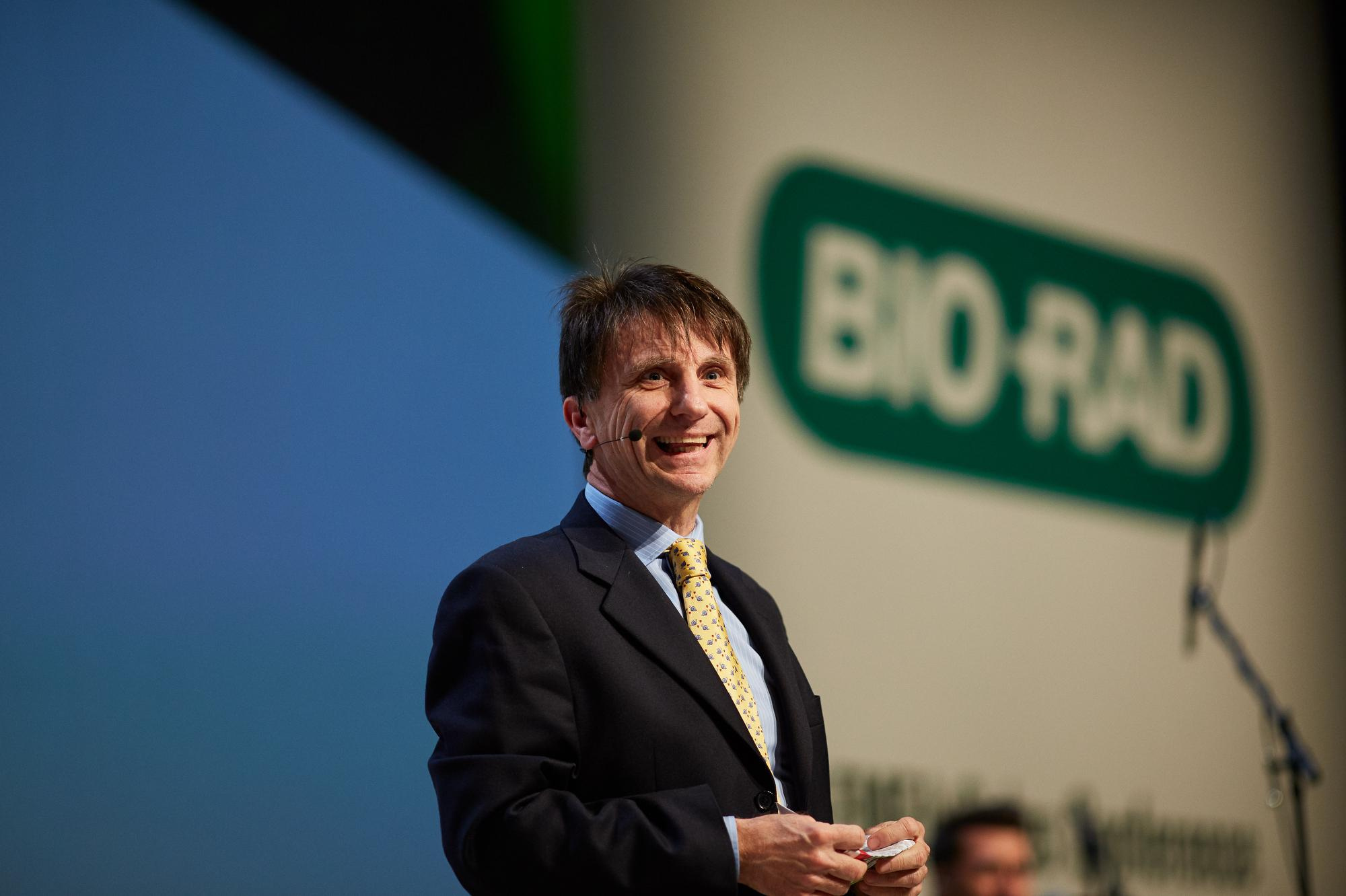 An executive speaks on stage during the 2018 gala event in Prague.