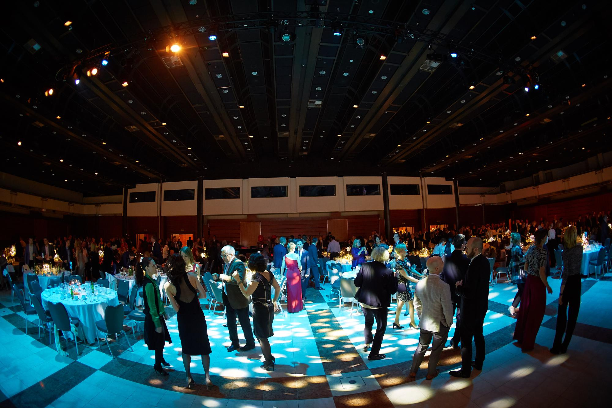 Cluster of partygoers enjoying the dance floor.