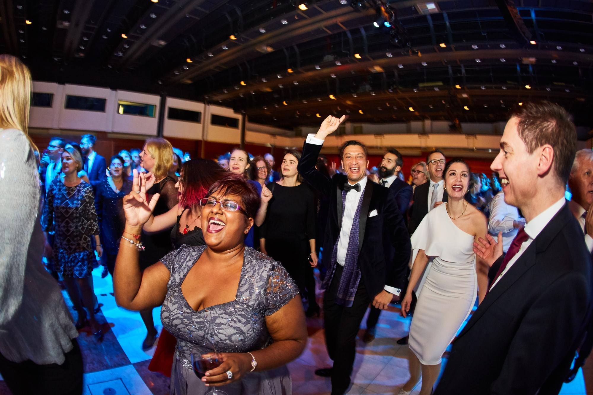 Bio-Rad employees dance near the state at the gala event in Prague.