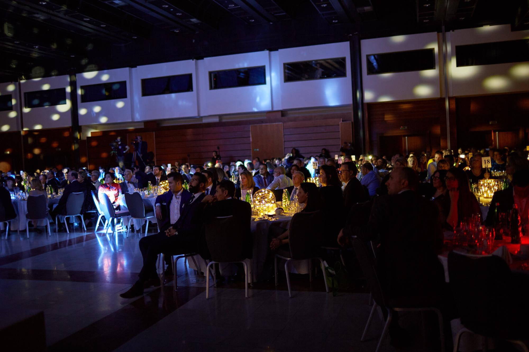 Bio-Rad attendees dance the night away during the gala event as a band performs.