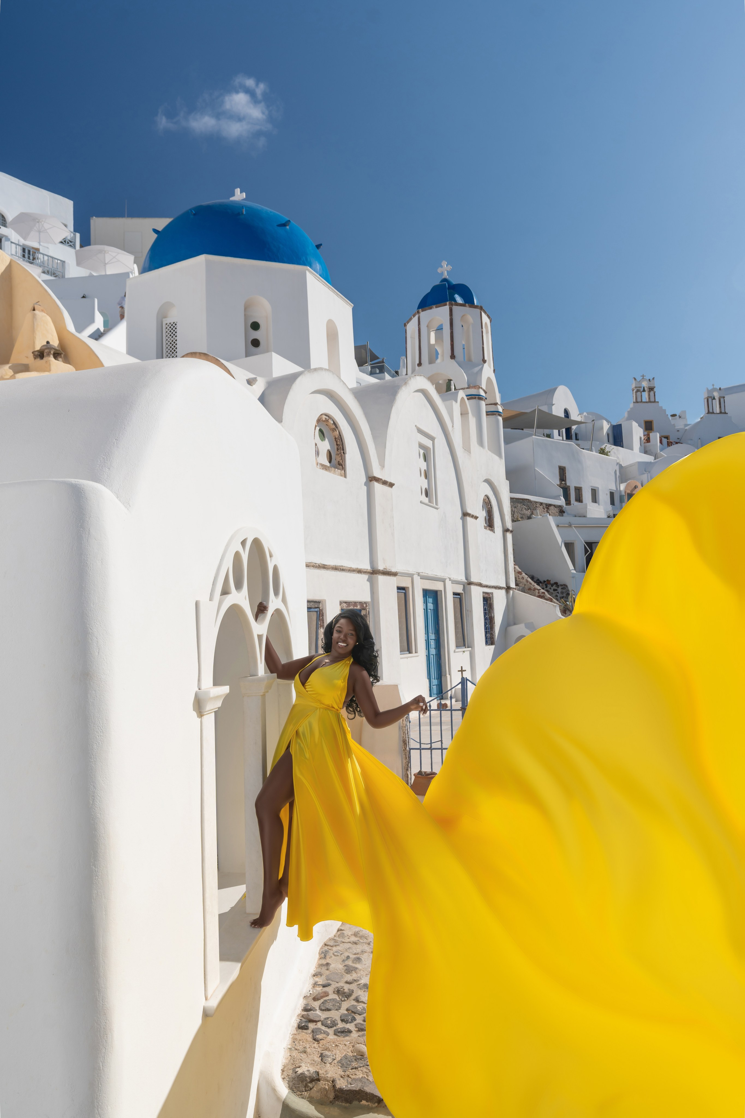 Radiant Moments in Santorini: Yellow Flying Dress Photoshoot by Sokolove"Bring your elegance to life with a yellow Flying Dress photoshoot in Santorini. Sokolove captures every radiant moment of your photoshoot, with Santorini’s breathtaking beauty as the perfect backdrop to highlight the golden glow of your look."