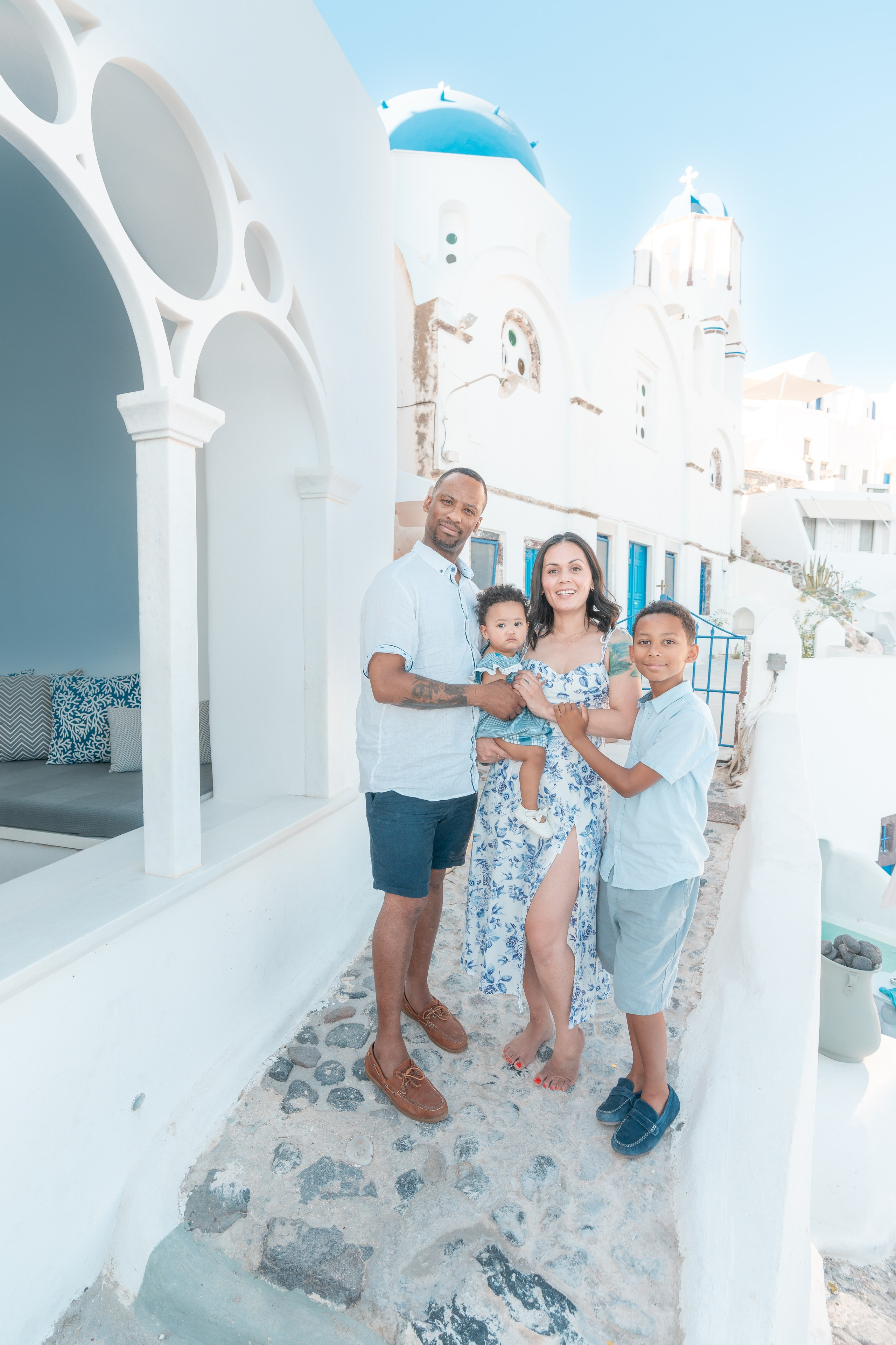 "Book a professional family photographer in Santorini and capture your love in the most beautiful setting. Perfect for vacations, anniversaries, or special milestones."