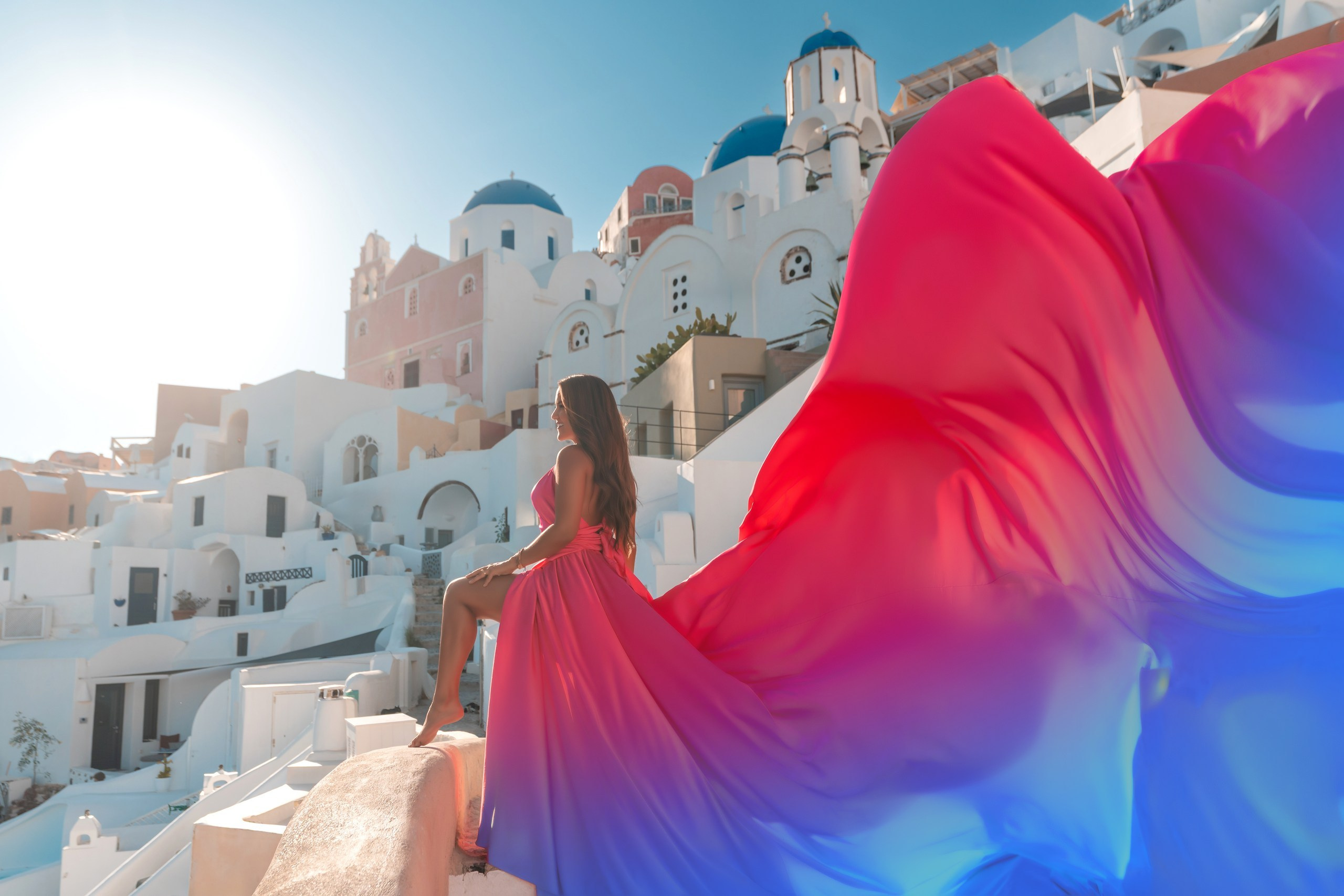 Santorini Flying Dress Photoshoot 2025 sunset time in Oia