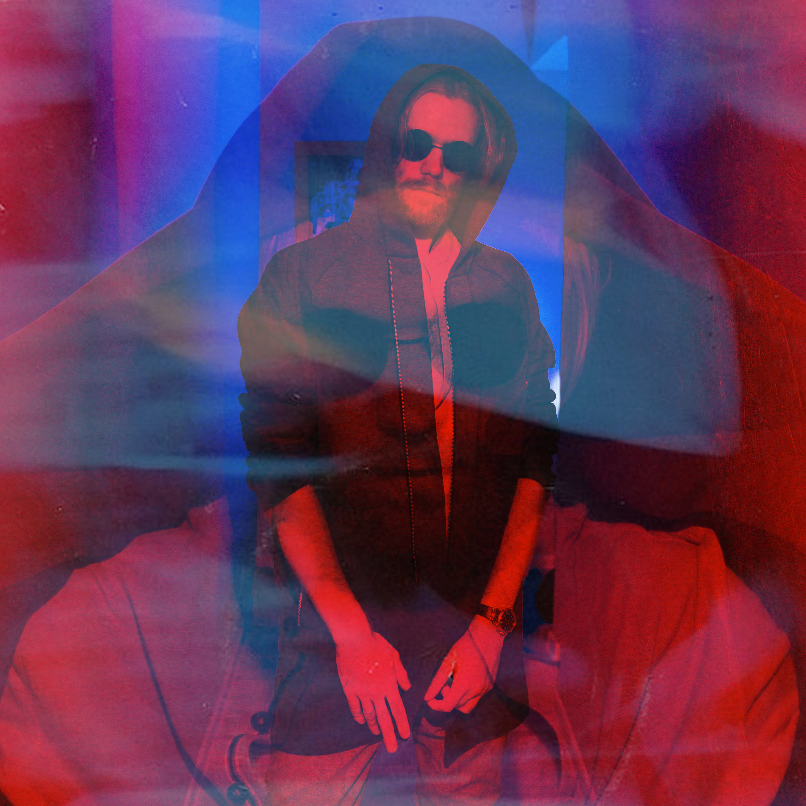 Abstract image with red and blue overlay of a man in sunglasses and a hoodie
