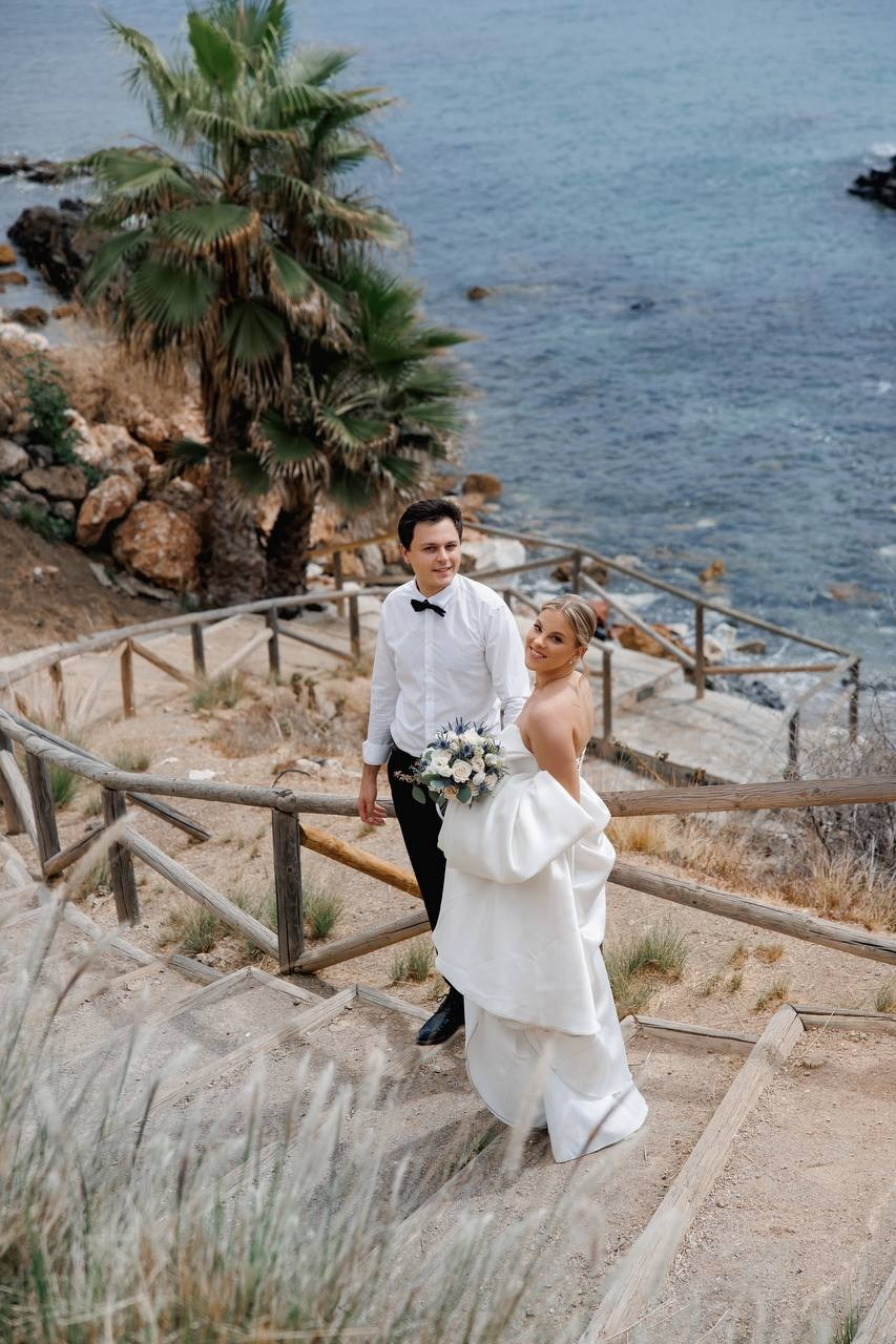 Bride and groom on a beach photoshoot