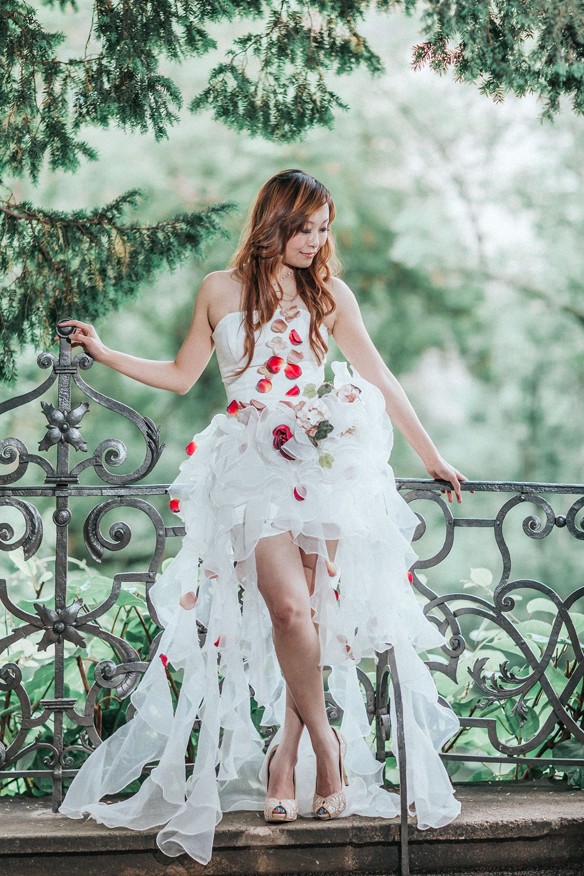 Chinese bride modeling her own creation.