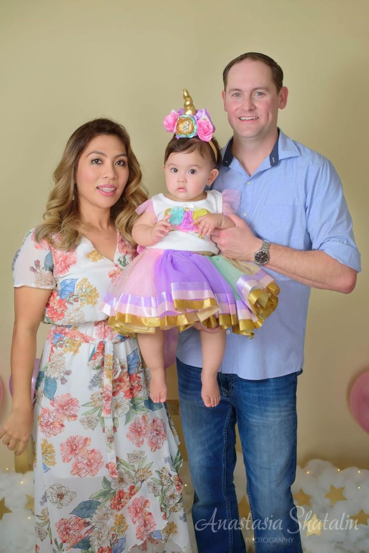 Unicorn cake smash session for Mia. Family photographer in Roseville, Rocklin, Folsom, Sacramento