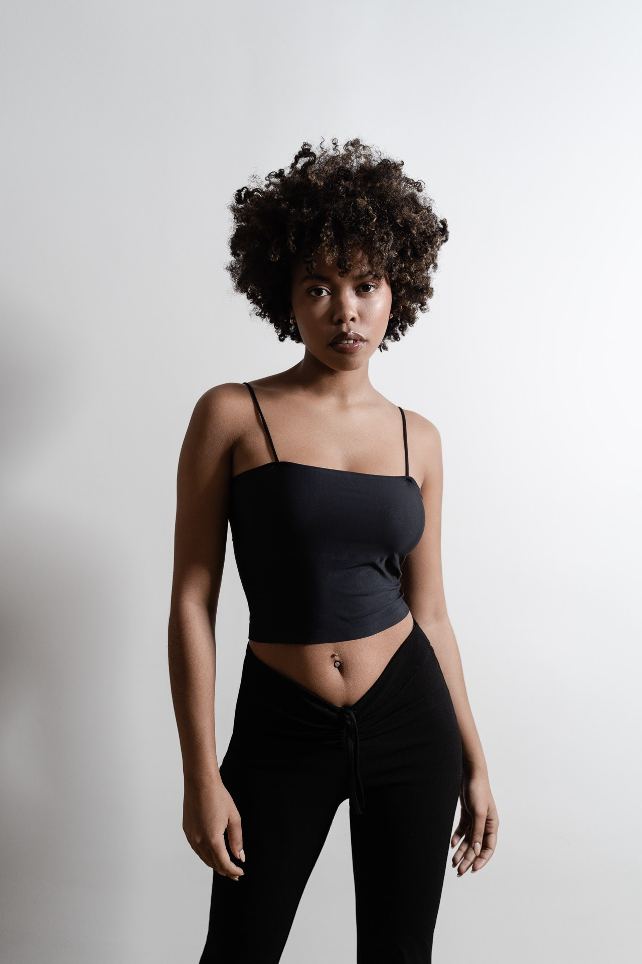 Clean studio digitals of female model on white background