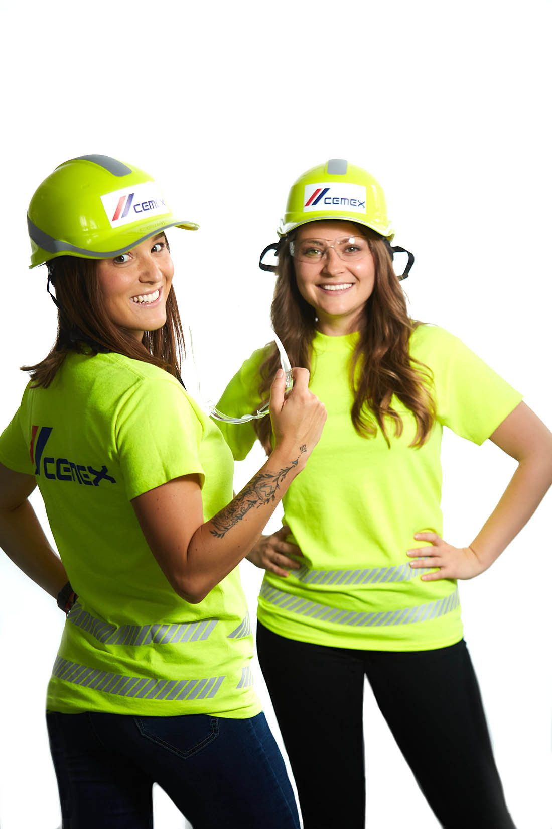CEMEX employees in safety gear, white backdrop portrait, Prague.