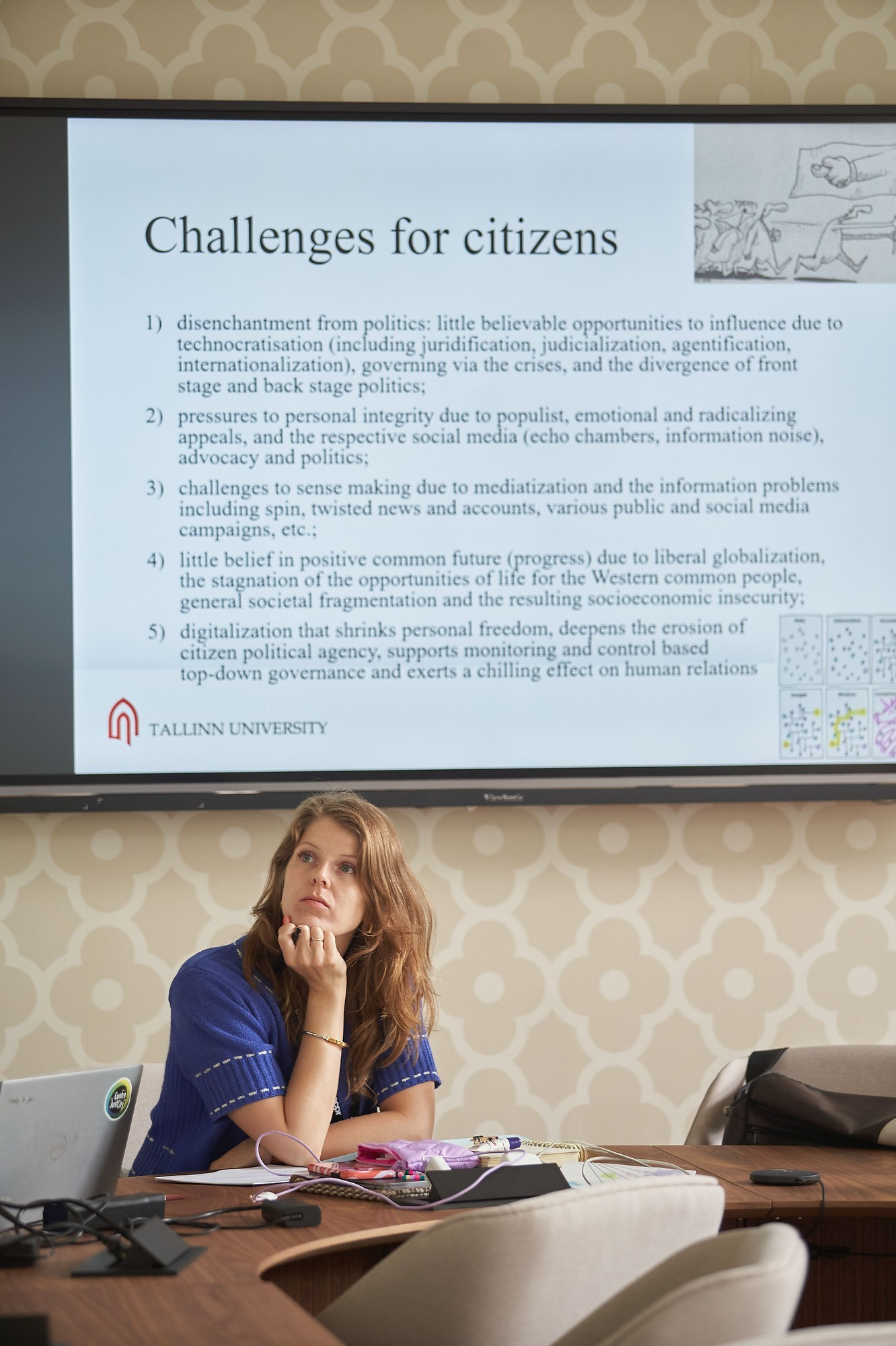 Attendees listen to a discussion in an ECPR workshop room.