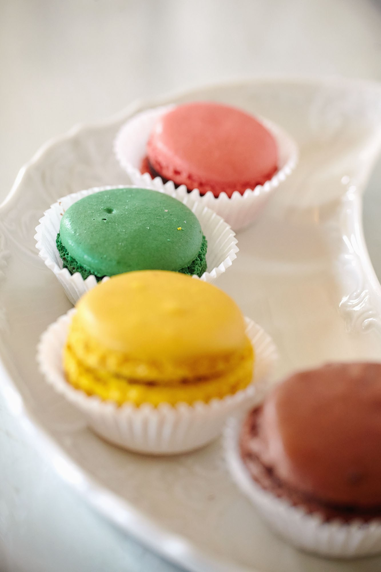 Colorful Macaroons are seen in the bridal suite during her preparation.