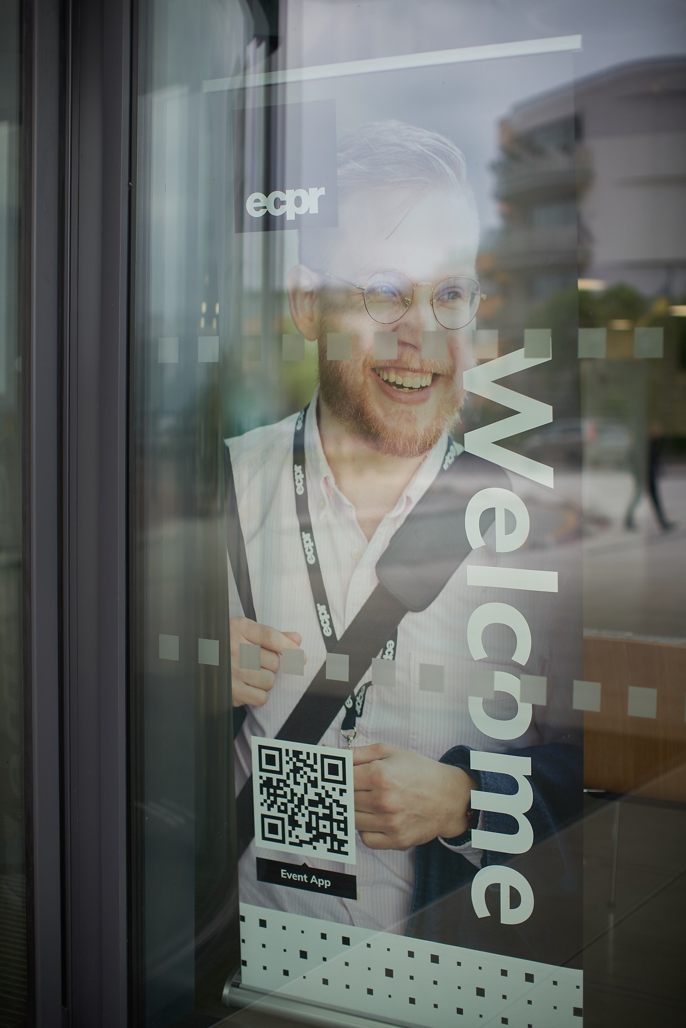 A poster welcoming scholars and speakers to the ECPR event in Prague.