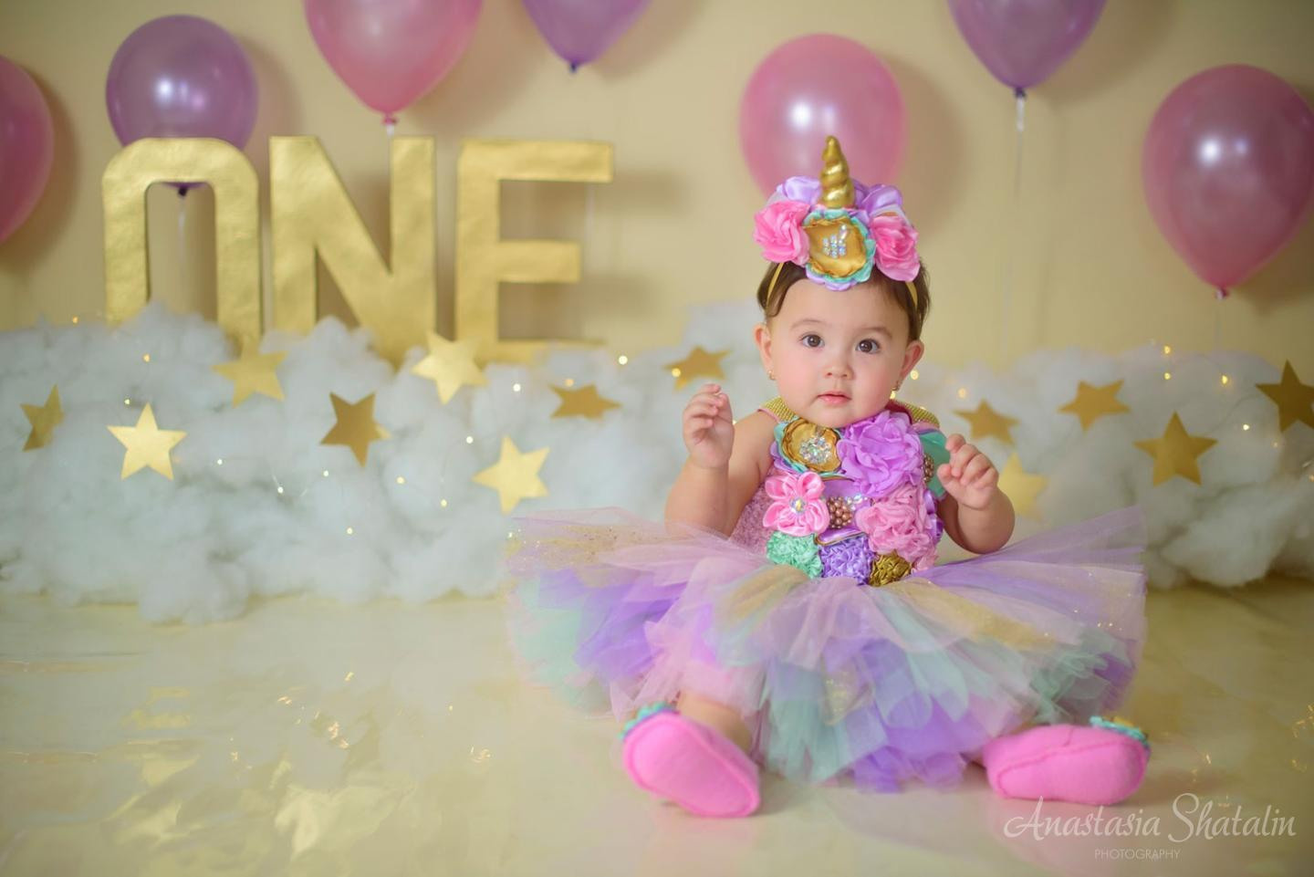Unicorn cake smash session for Mia. Family photographer in Roseville, Rocklin, Folsom, Sacramento