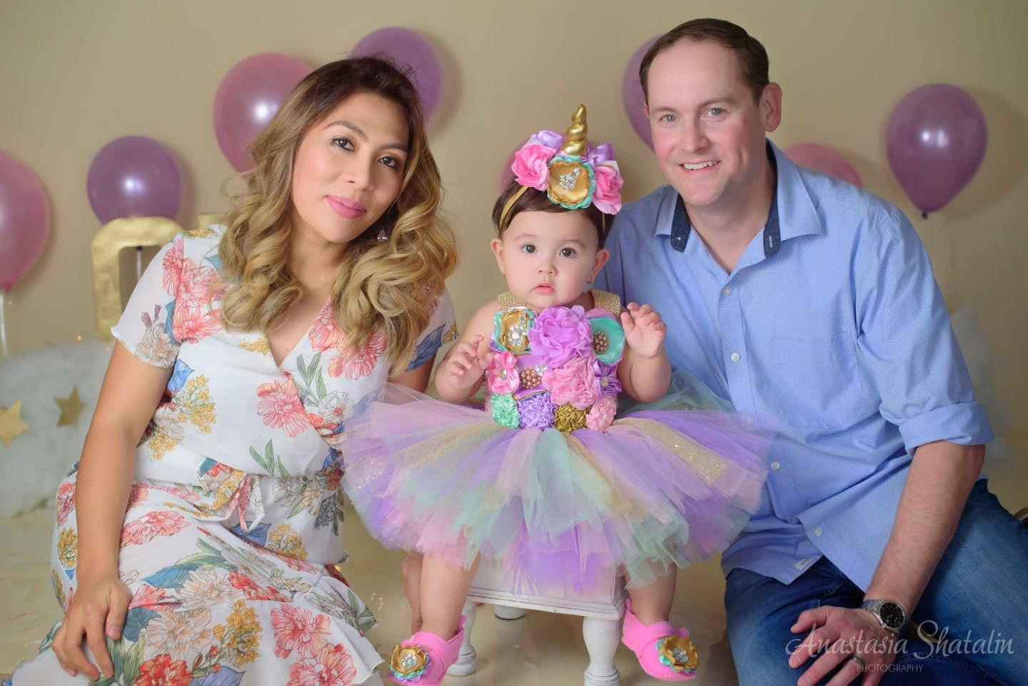 Unicorn cake smash session for Mia. Family photographer in Roseville, Rocklin, Folsom, Sacramento