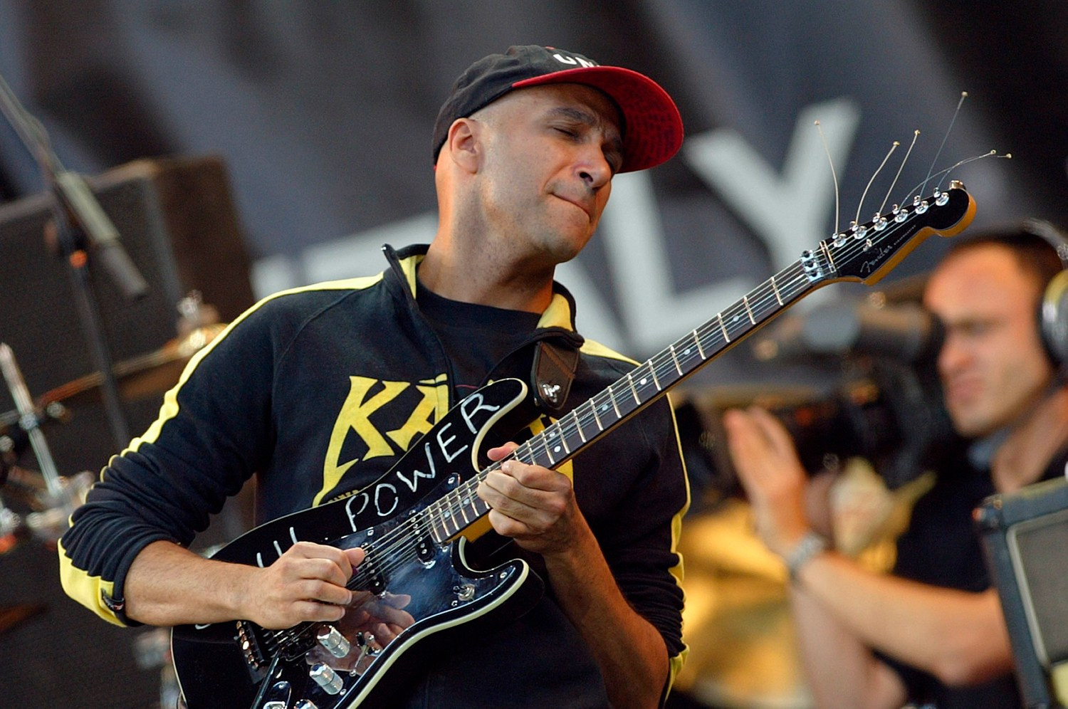 Tom Morello shreds a blazing guitar solo during Audioslave’s intense performance.