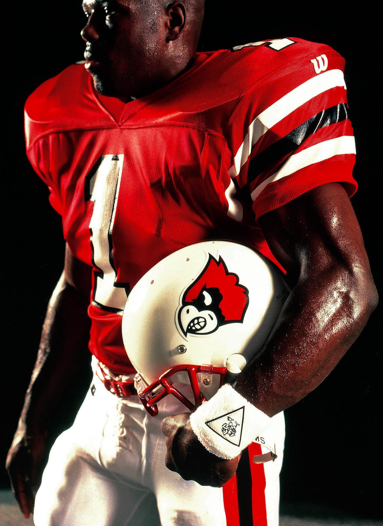 UofL football player portrait for media guide cover.