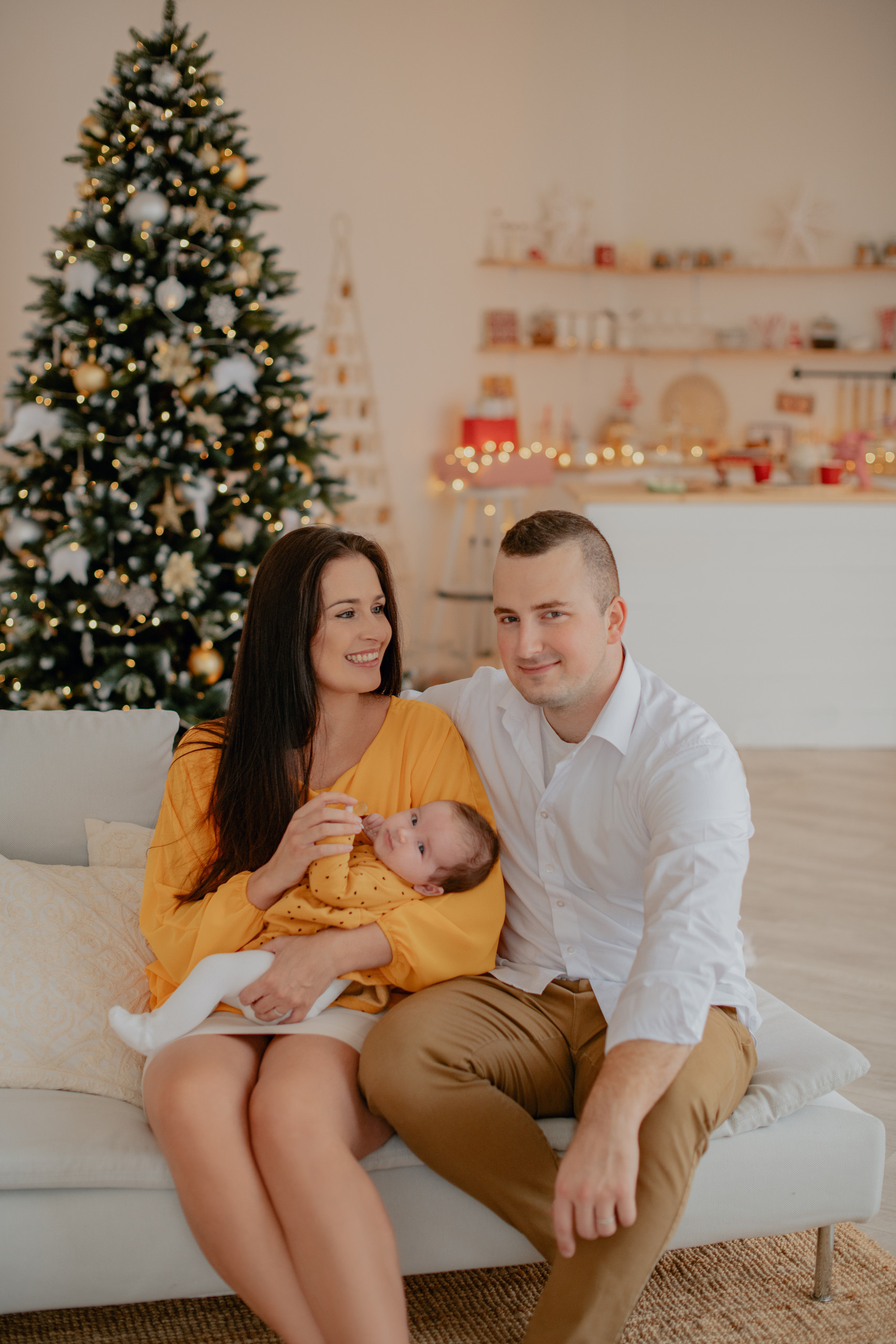 Family photography in a Christmas studio in Prague. Professional photographer in Prague Anastasia Haritonova