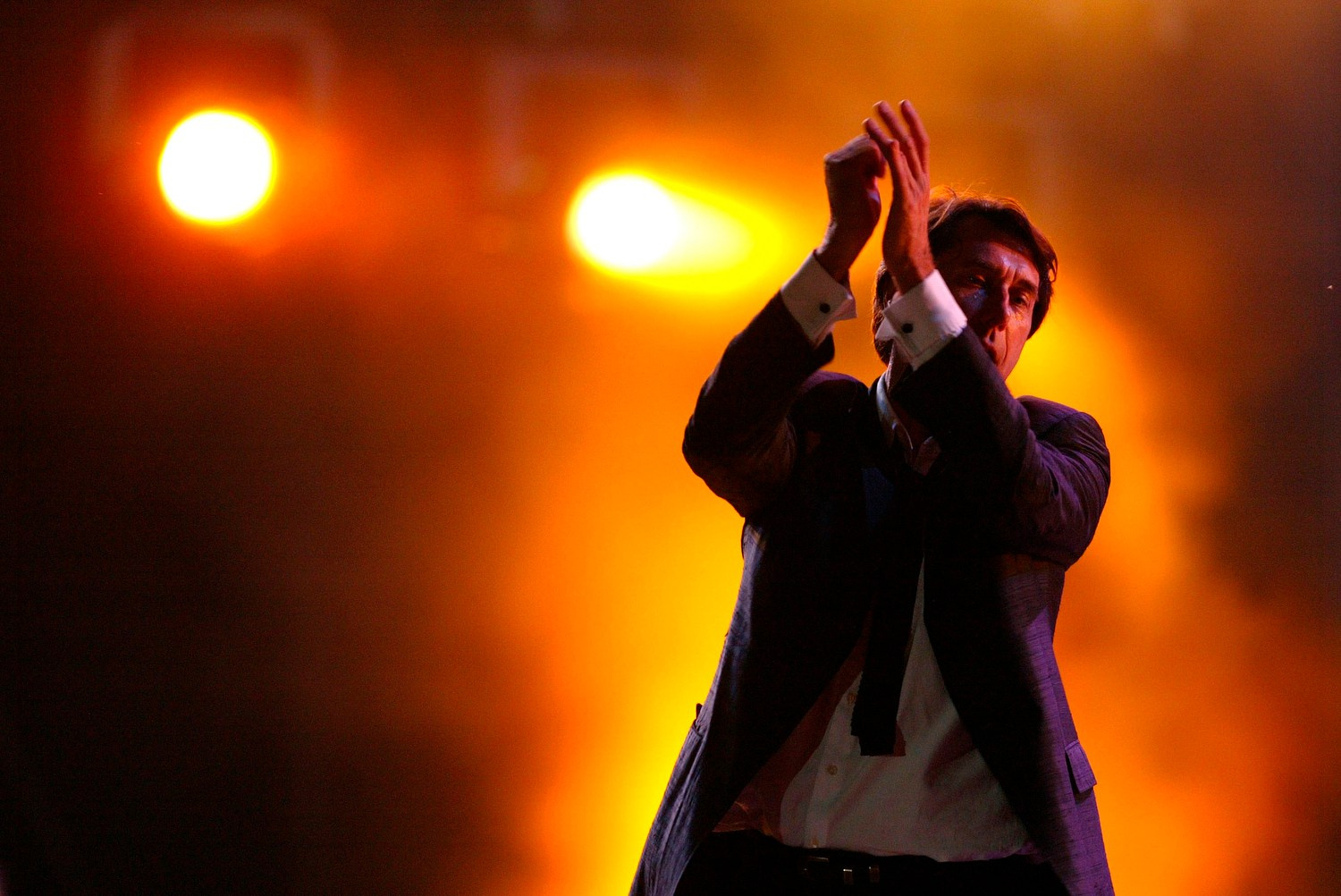 Bryan Ferry, Roxy Music’s suave frontman, owns the Siegessäule stage with timeless charisma.