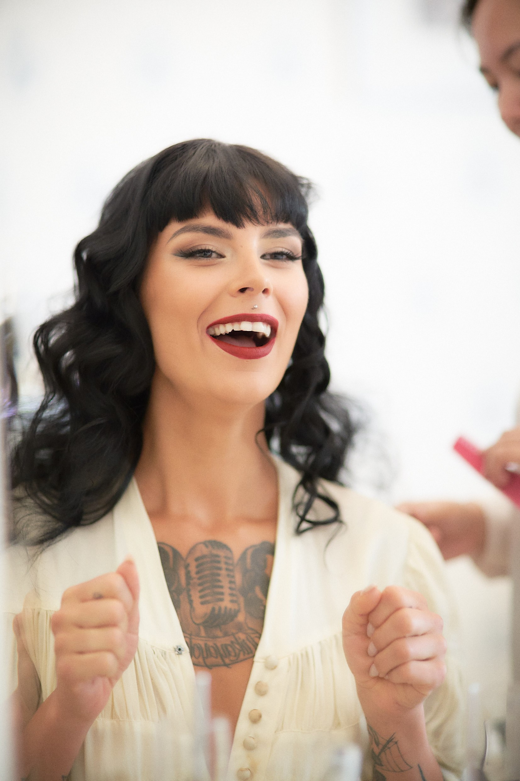 The always smiling tattooed bride.