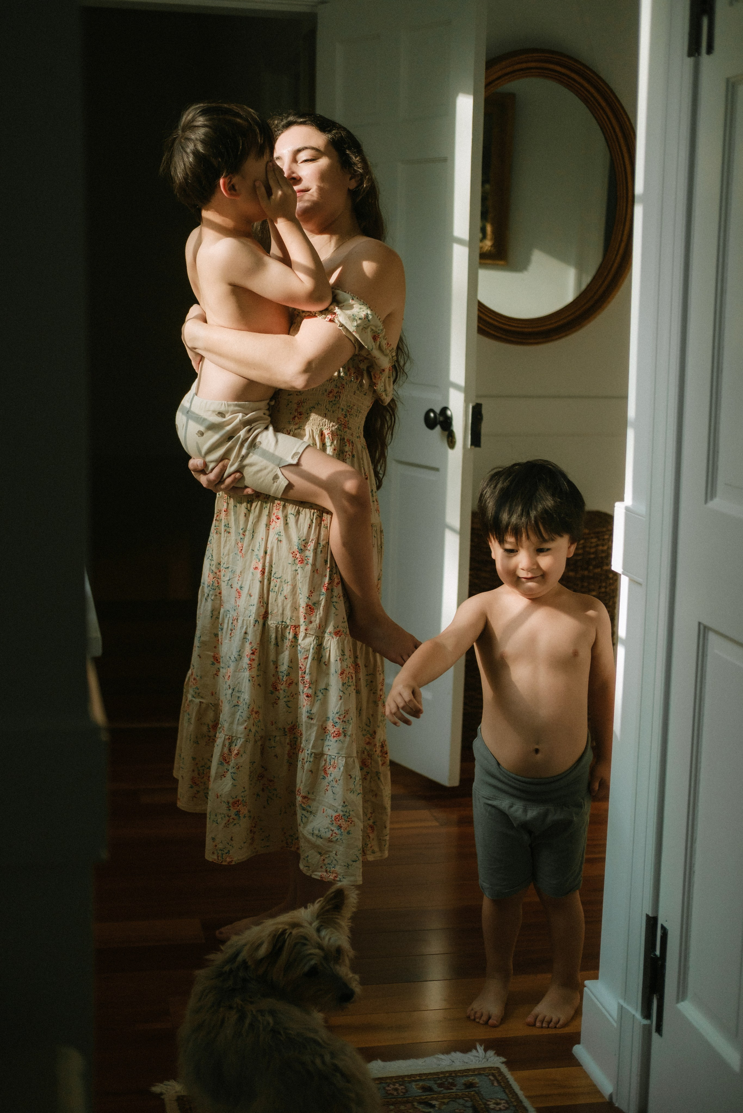 Artistic family photograpth of a mom with her two children captured at home in Richmond, VA